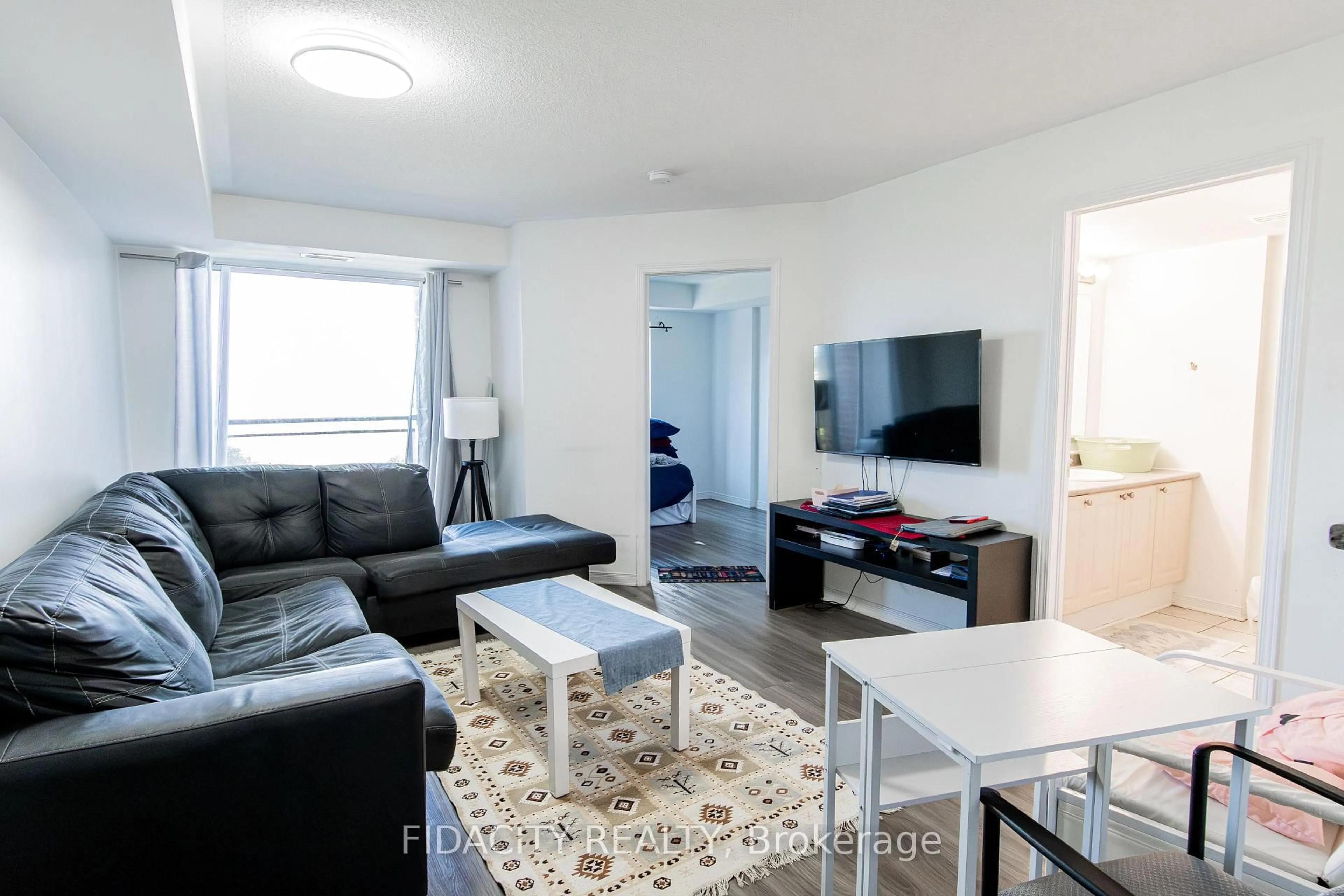 Living room with furniture, unknown for 310 Central Park Dr #8A, Ottawa Ontario K2C 4G4