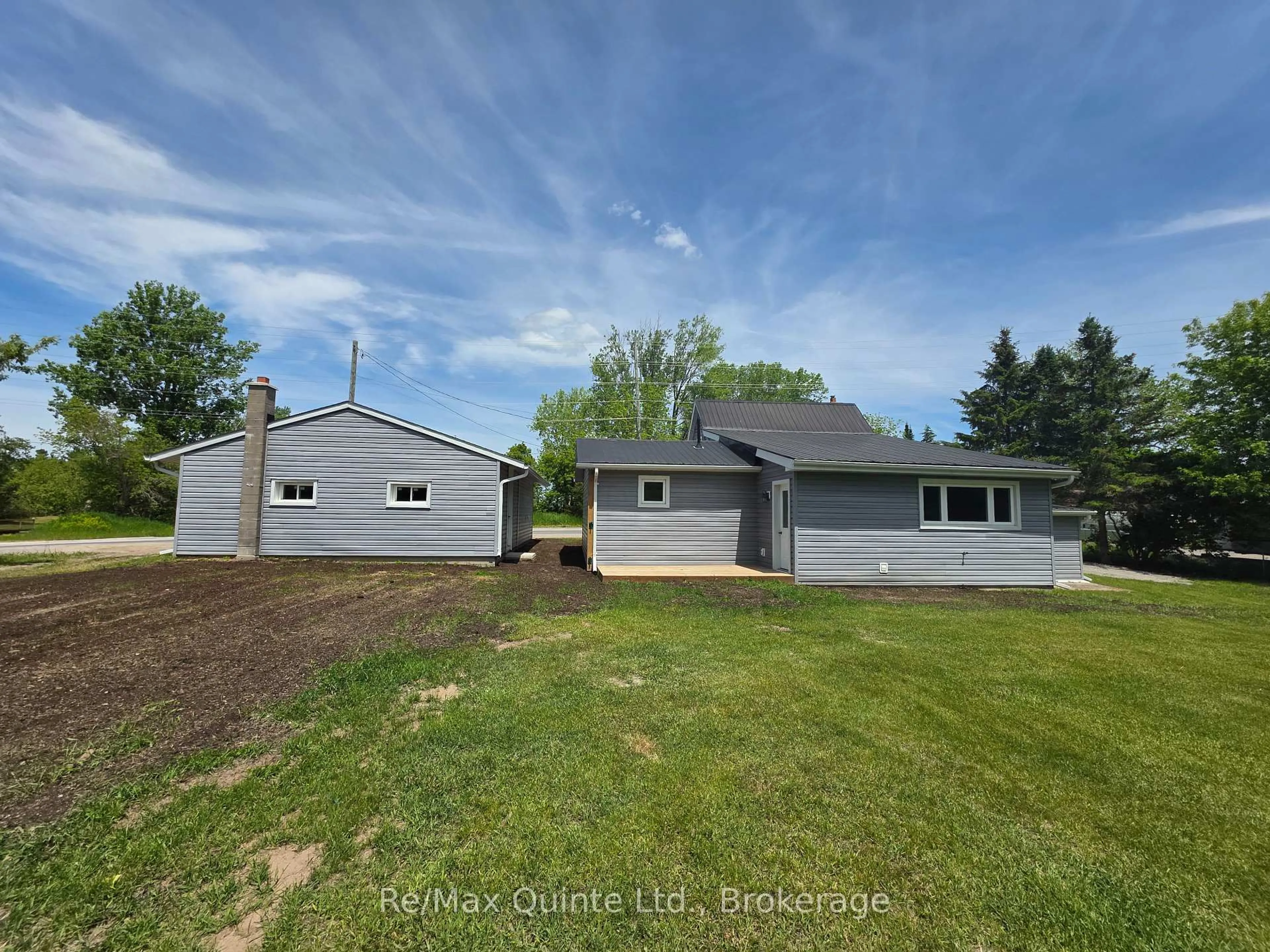 A pic from outside/outdoor area/front of a property/back of a property/a pic from drone, building for 61 COUNTY ROAD 1 Rd, Prince Edward County Ontario K0K 2T0