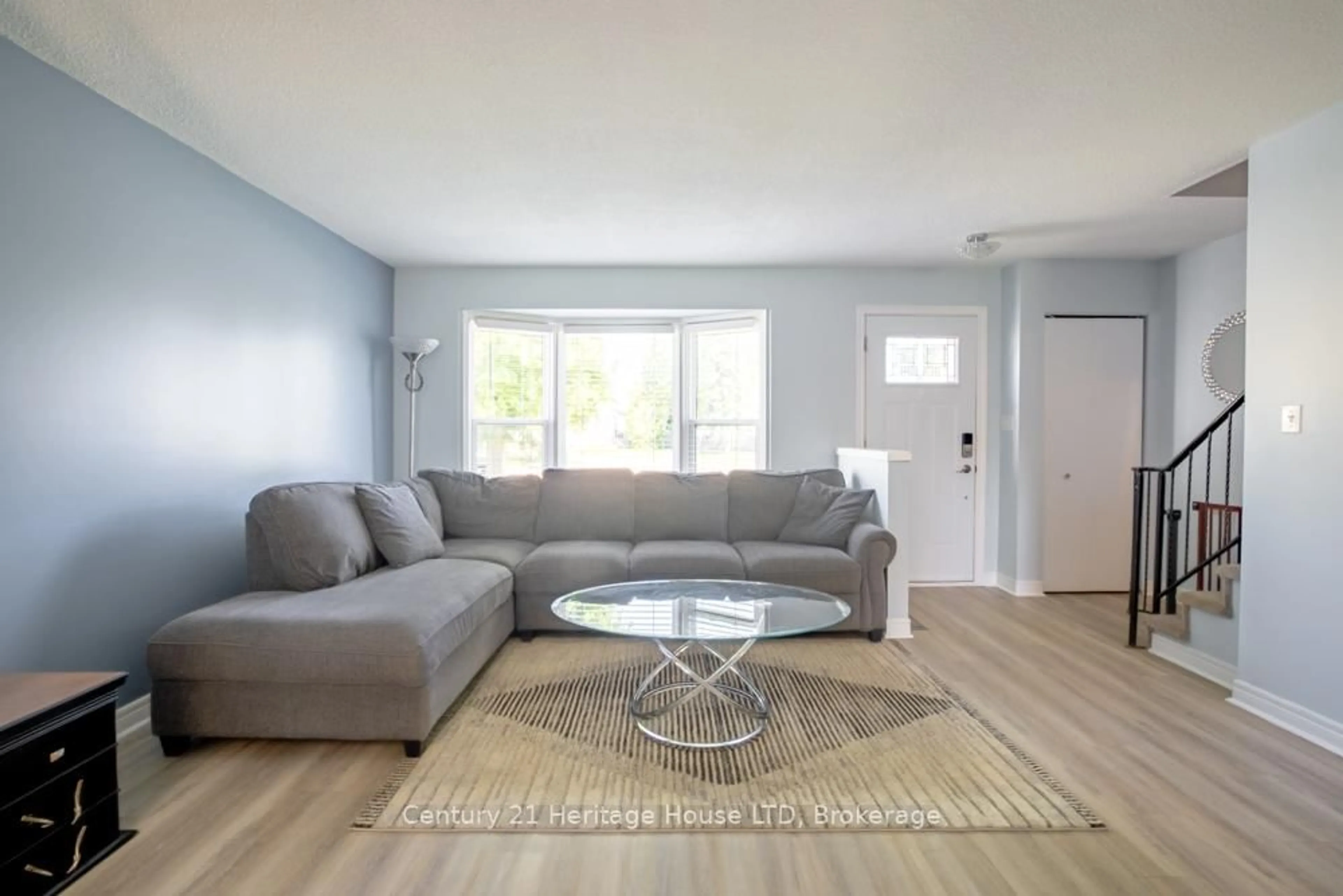 Living room with furniture, unknown for 20 Baldwin Circ, Thorold Ontario L2V 4H5