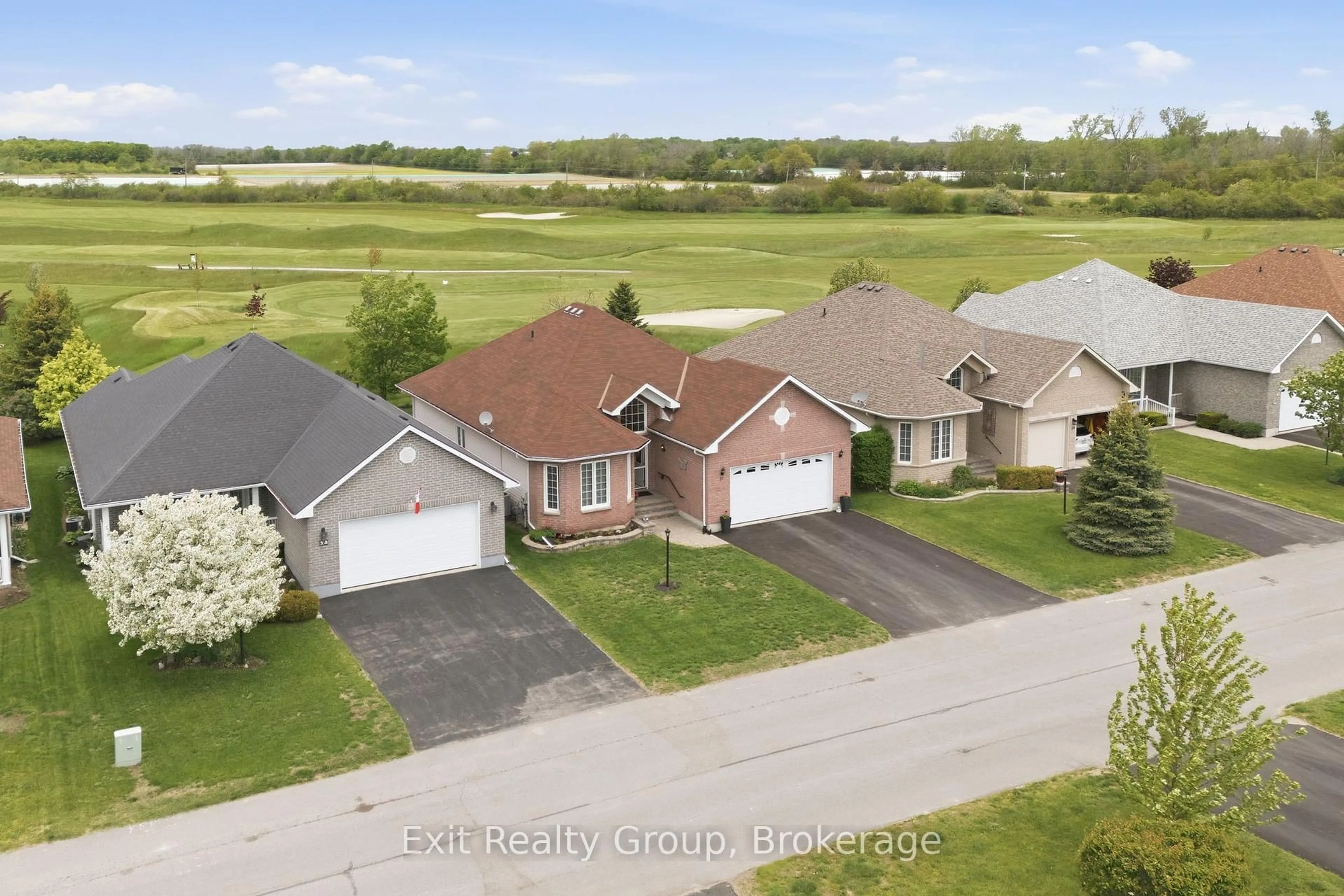 A pic from outside/outdoor area/front of a property/back of a property/a pic from drone, street for 37 Aletha Dr, Prince Edward County Ontario K0K 3L0