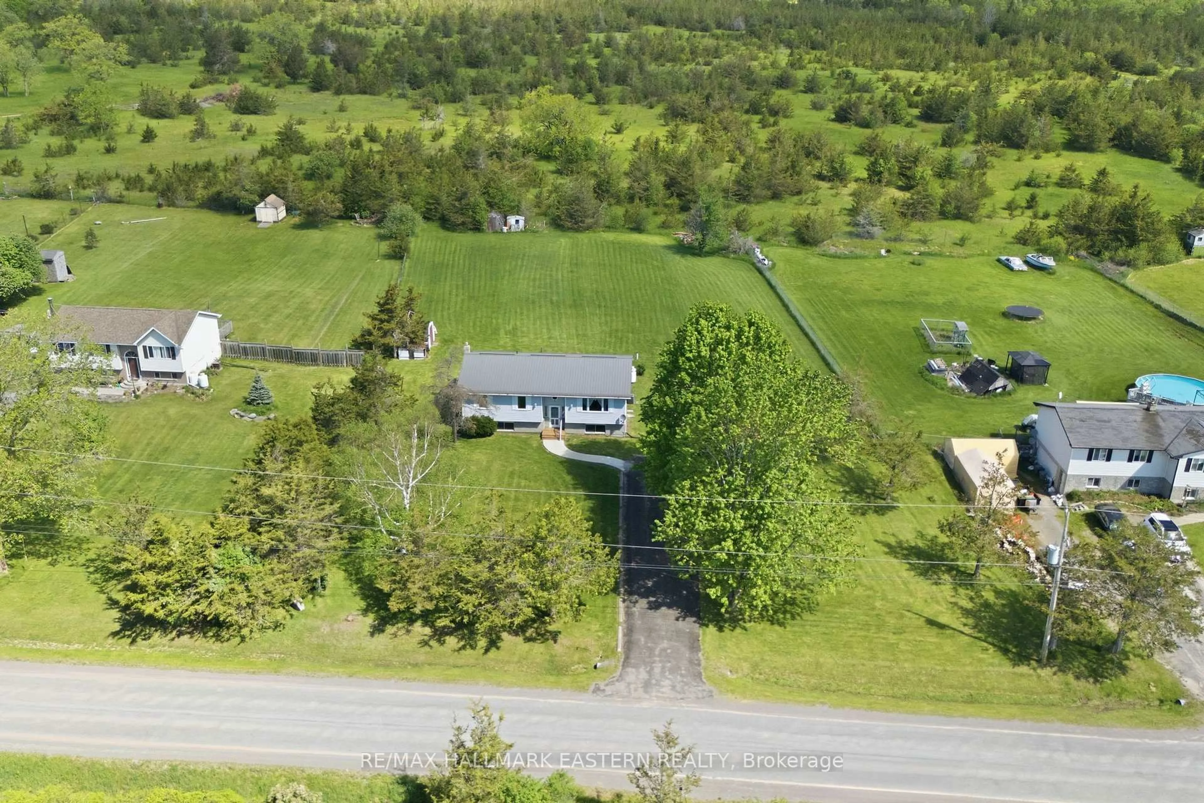 A pic from outside/outdoor area/front of a property/back of a property/a pic from drone, water/lake/river/ocean view for 387 Hinchey Rd, Shannonville Ontario K0K 3A0