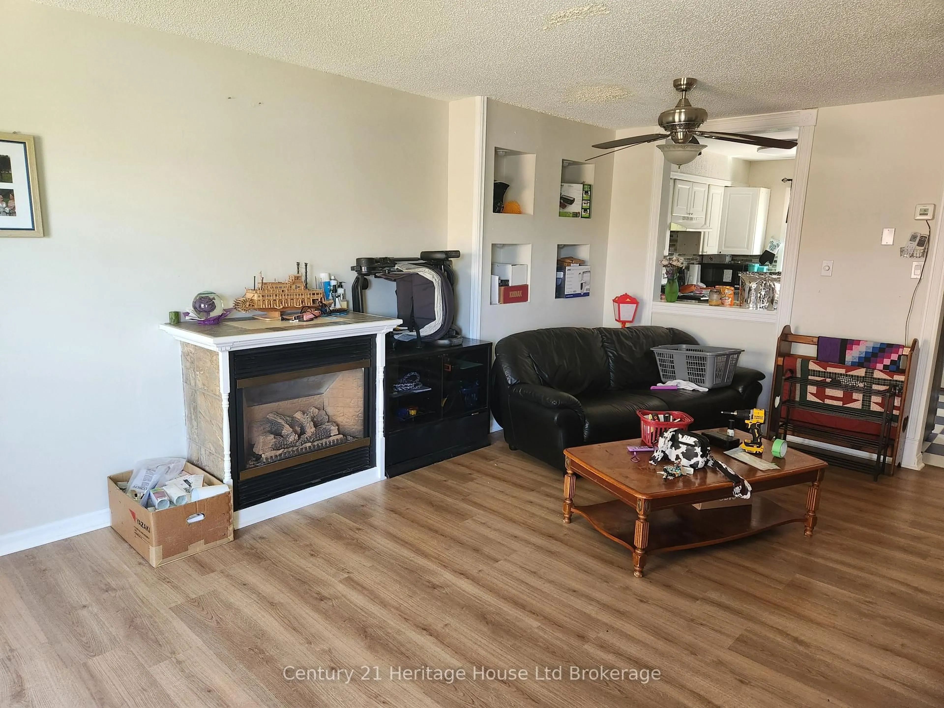 Living room with furniture, wood/laminate floor for 380 Springbank Ave #6, Woodstock Ontario N4T 1L8