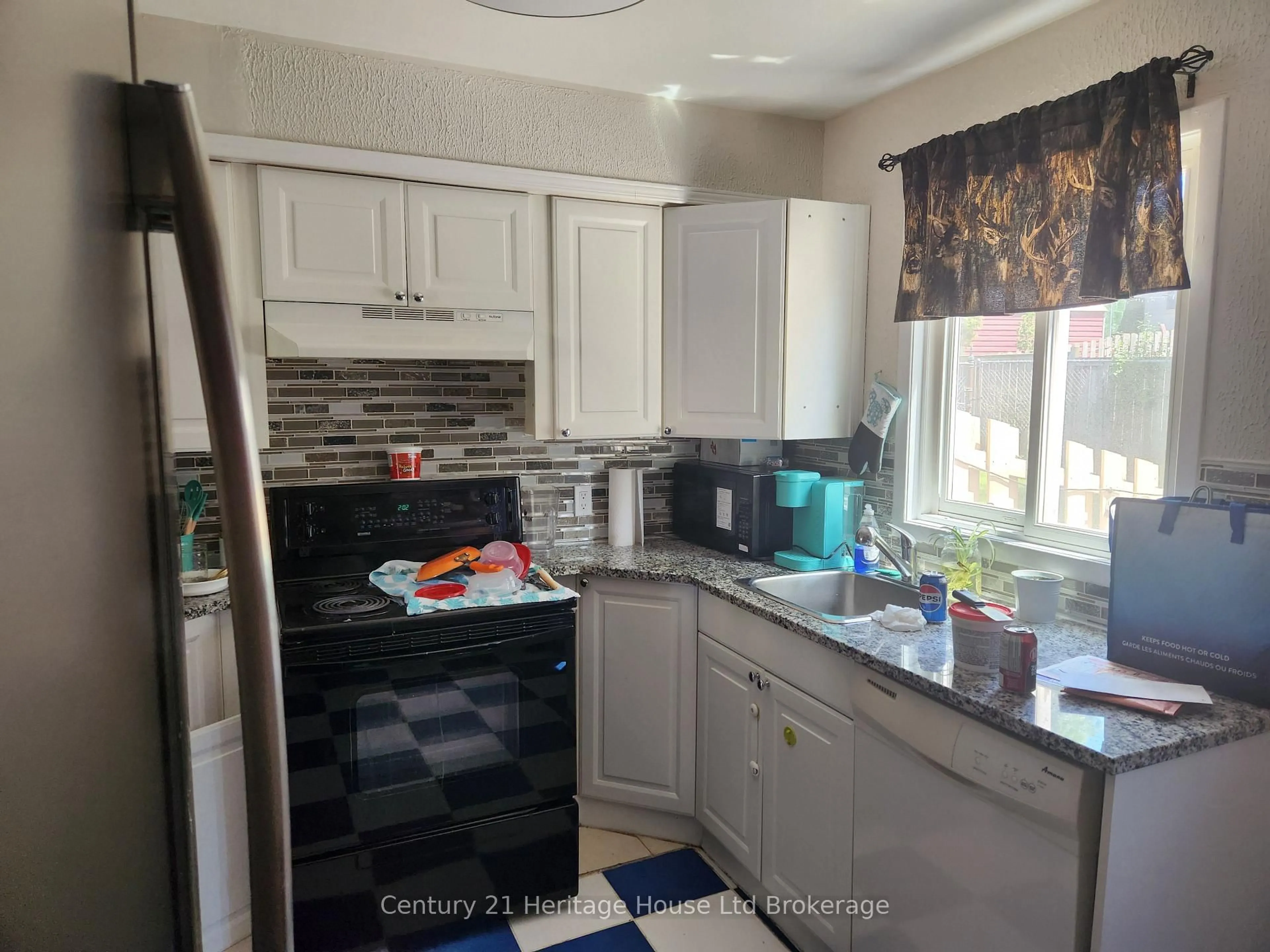 Standard kitchen, ceramic/tile floor for 380 Springbank Ave #6, Woodstock Ontario N4T 1L8