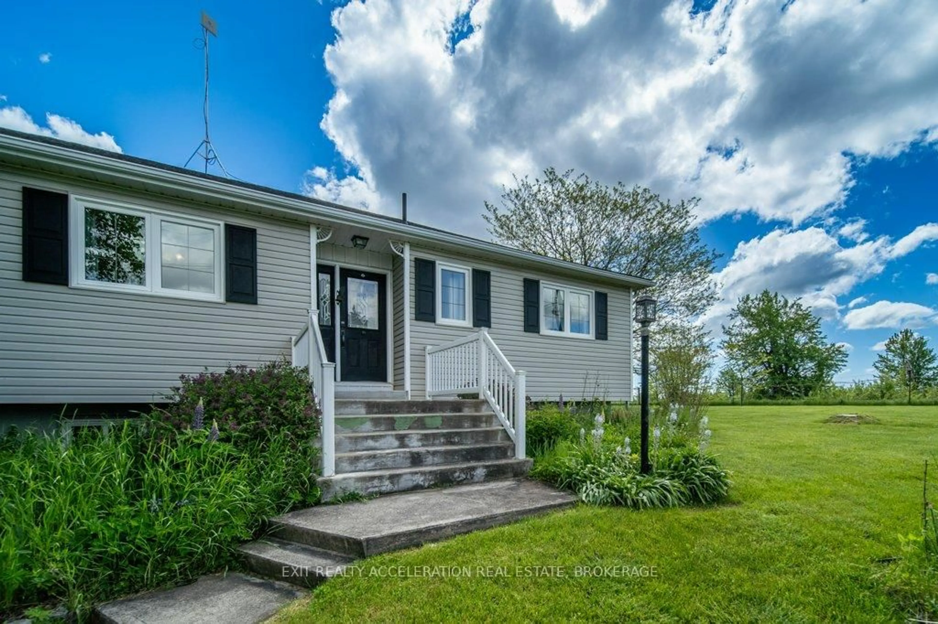 Home with vinyl exterior material, street for 1225 Townline Rd, Napanee Ontario K7R 3K6