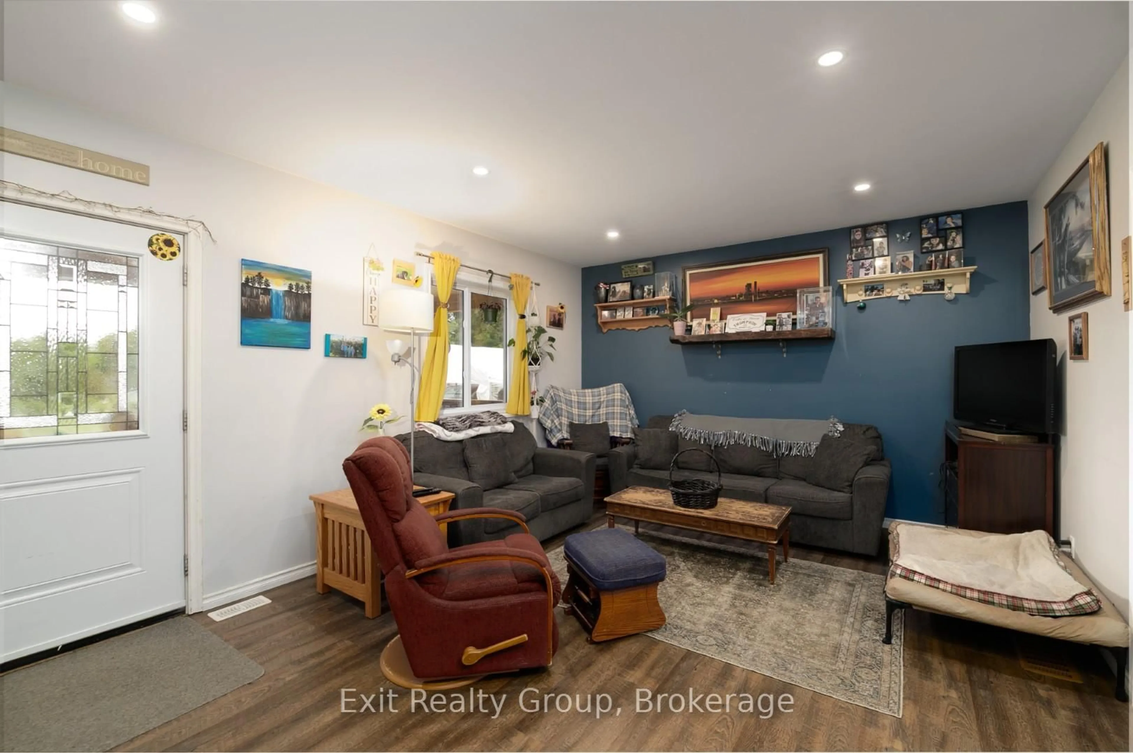 Living room with furniture, wood/laminate floor for 5084 Stirling Marmora Rd, Stirling-Rawdon Ontario K0K 3C0