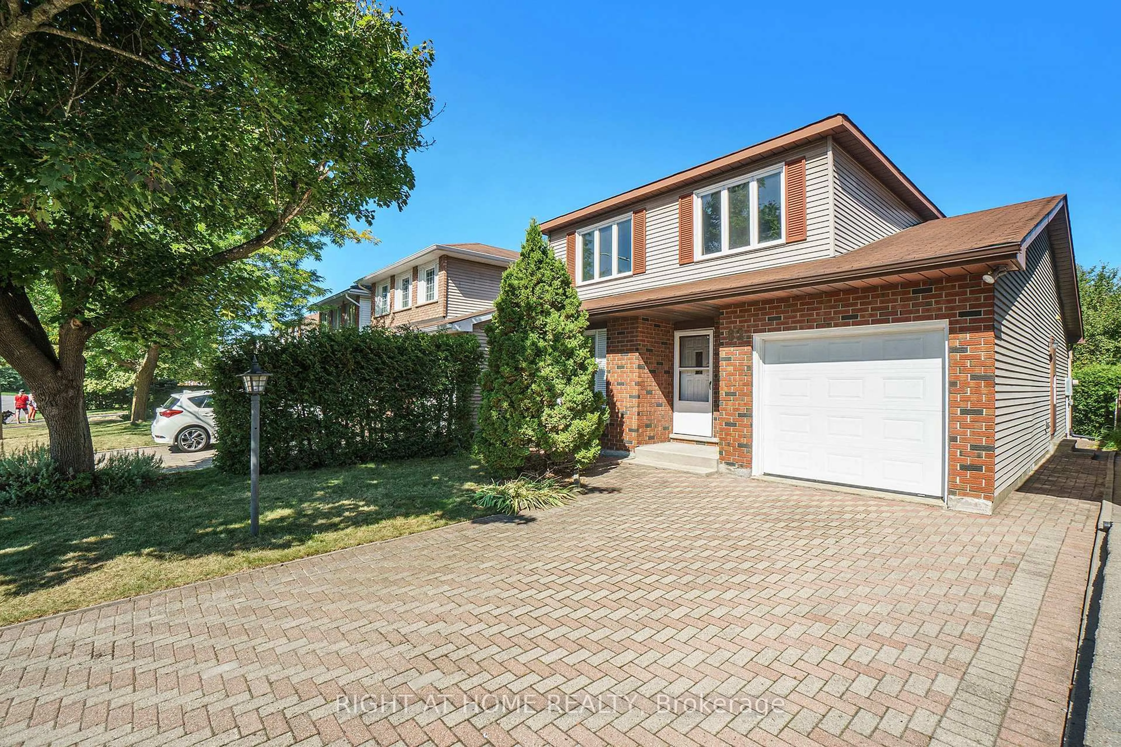 Home with brick exterior material, street for 82 Nestow Dr, Ottawa Ontario K2G 4L8