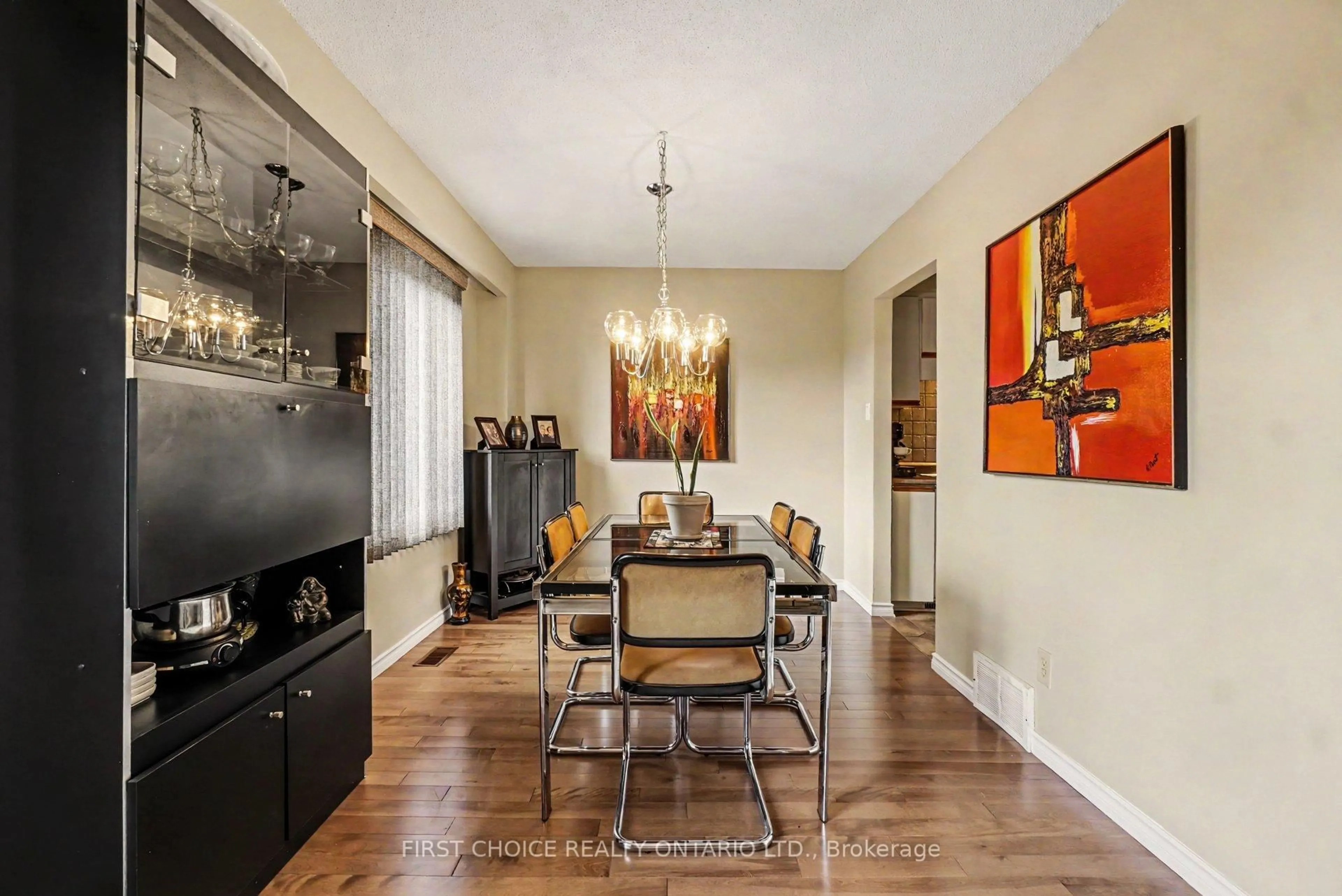 Dining room, wood/laminate floor for 1793 Axminster Crt #34, Ottawa Ontario K1C 1Z5