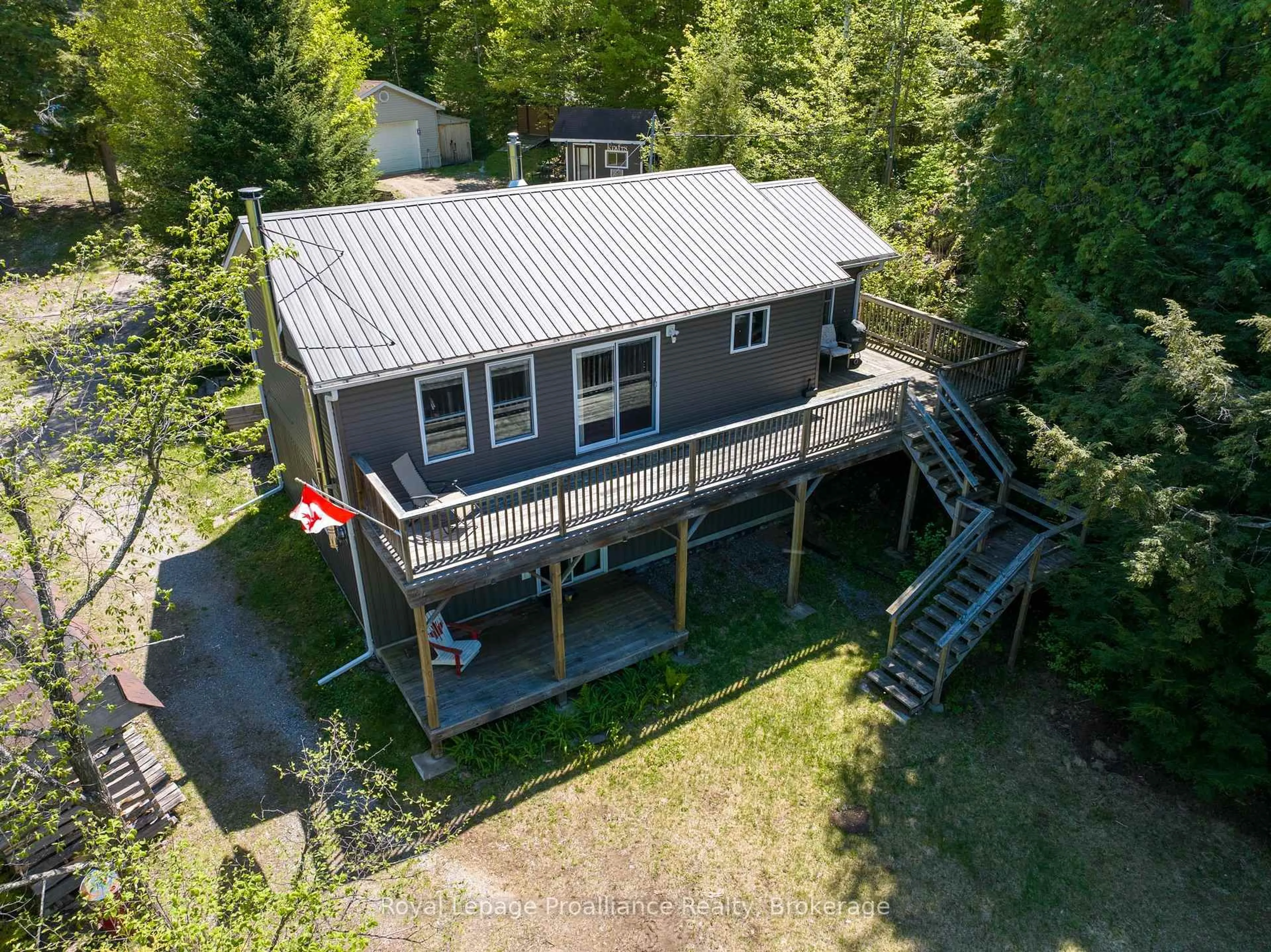 A pic from outside/outdoor area/front of a property/back of a property/a pic from drone, unknown for 1084C Ridge Lane, Ardoch Ontario K0H 1C0
