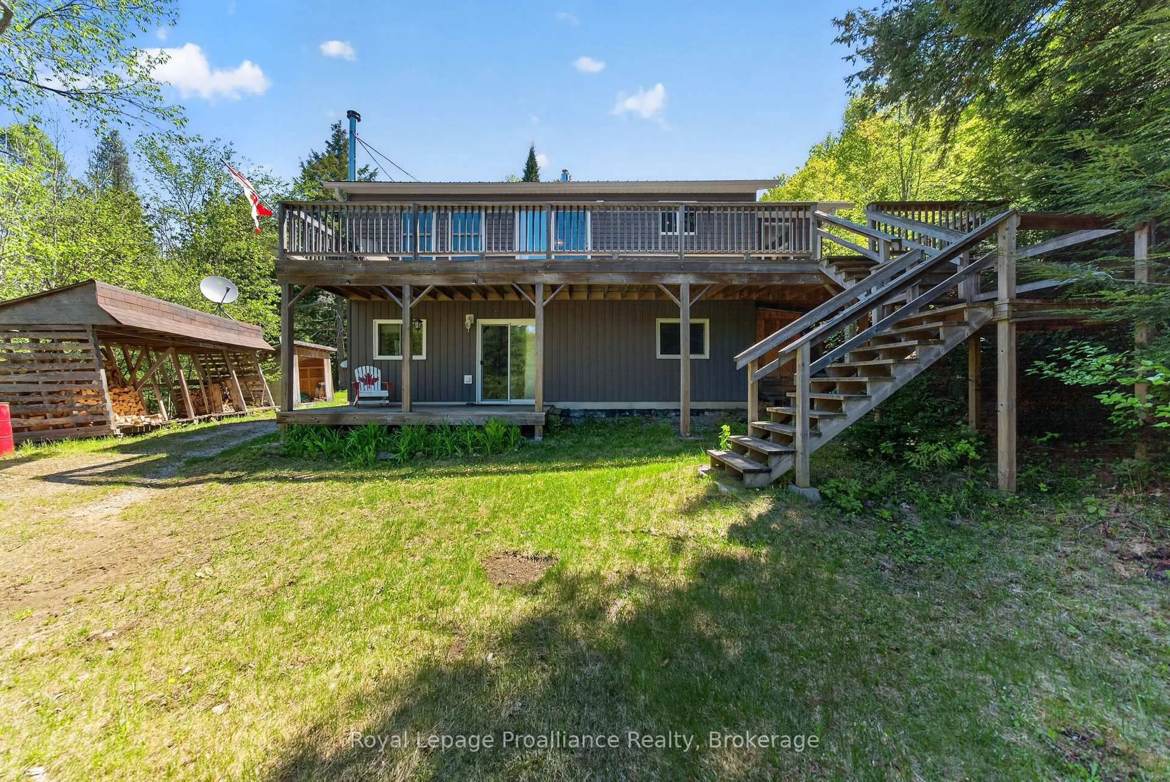 A pic from outside/outdoor area/front of a property/back of a property/a pic from drone, water/lake/river/ocean view for 1084C Ridge Lane, Ardoch Ontario K0H 1C0