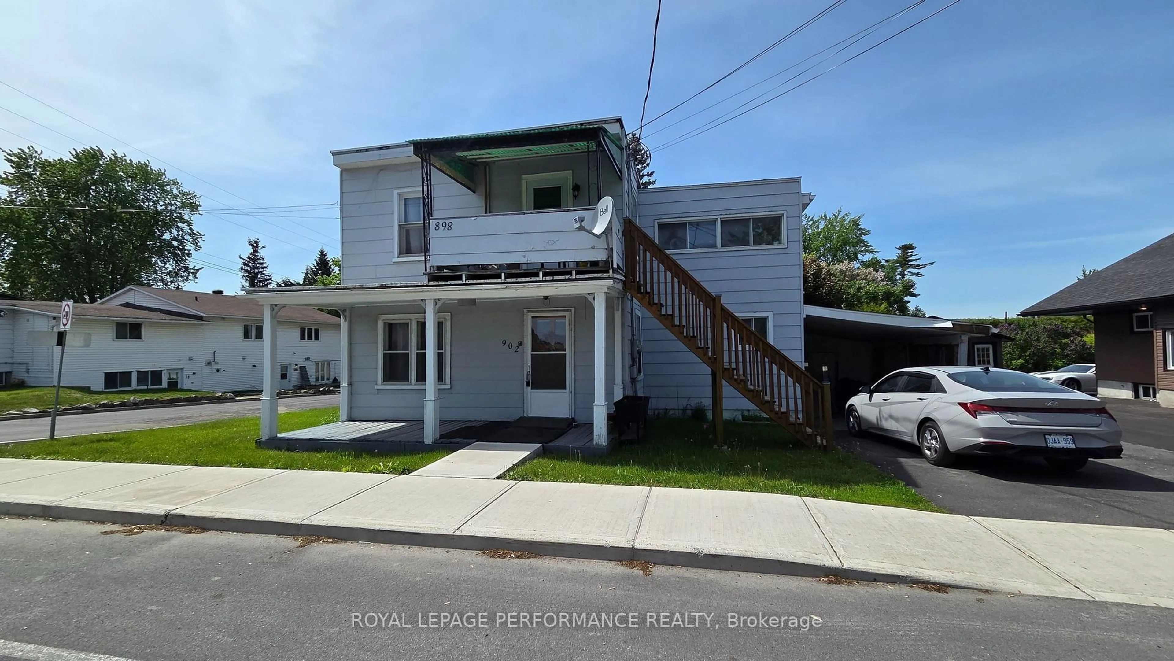 Home with vinyl exterior material, street for 902 Front Rd, Champlain Ontario K0B 1K0
