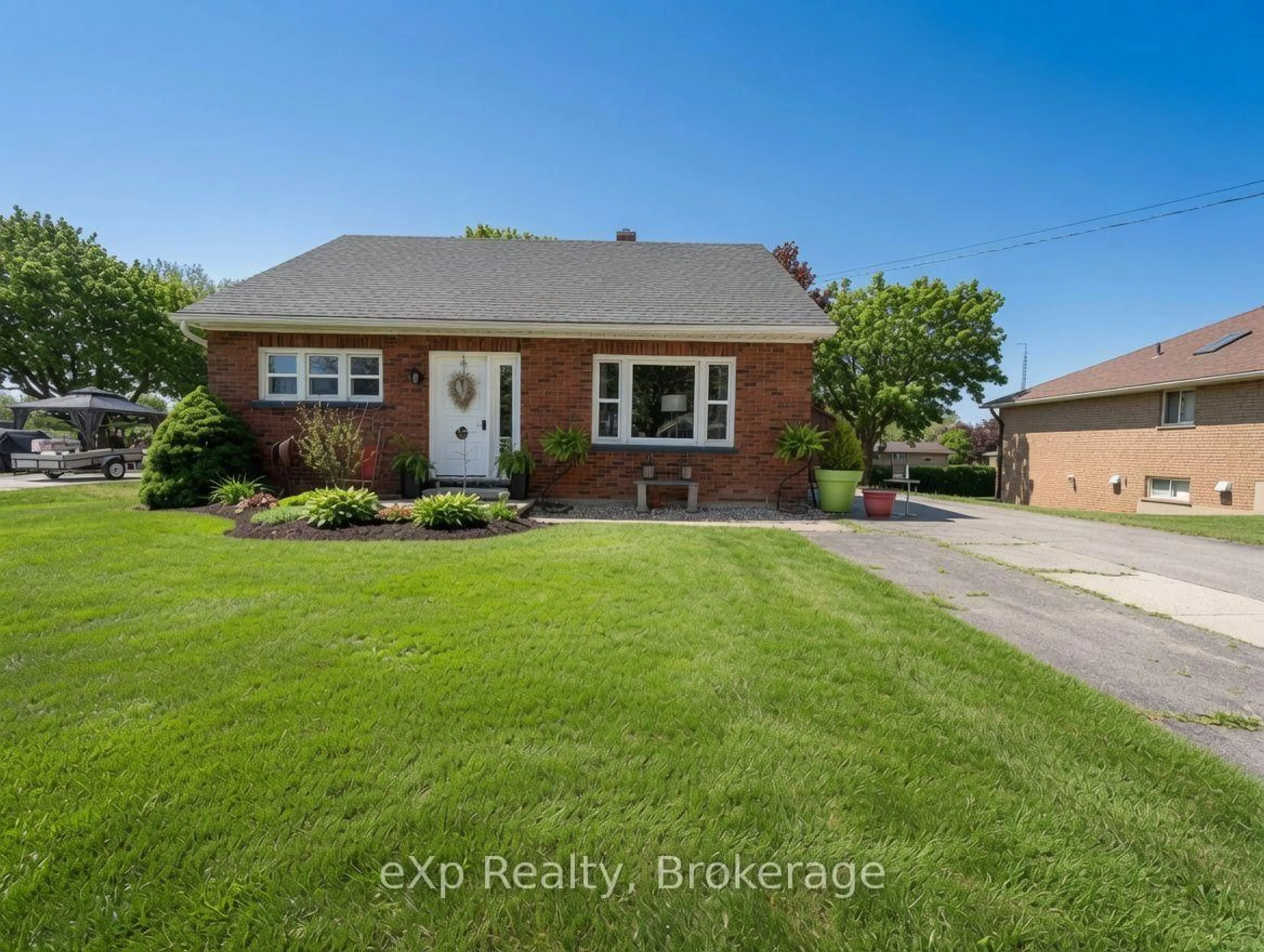 Home with brick exterior material, street for 1043 9 Highway, South Bruce Ontario N0G 2J0