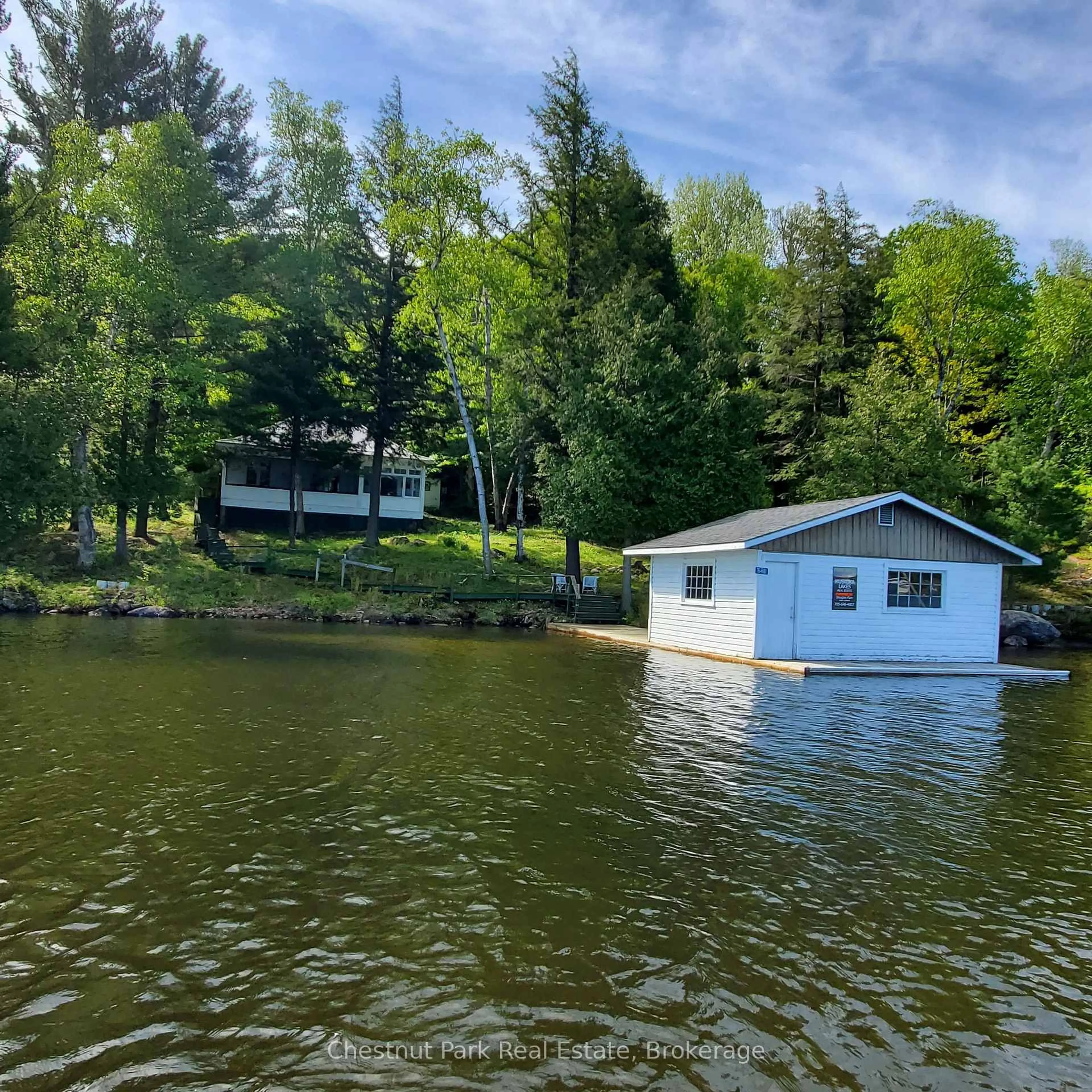A pic from outside/outdoor area/front of a property/back of a property/a pic from drone, water/lake/river/ocean view for 76 Tobin Island, Muskoka Lakes Ontario P0B 1J0
