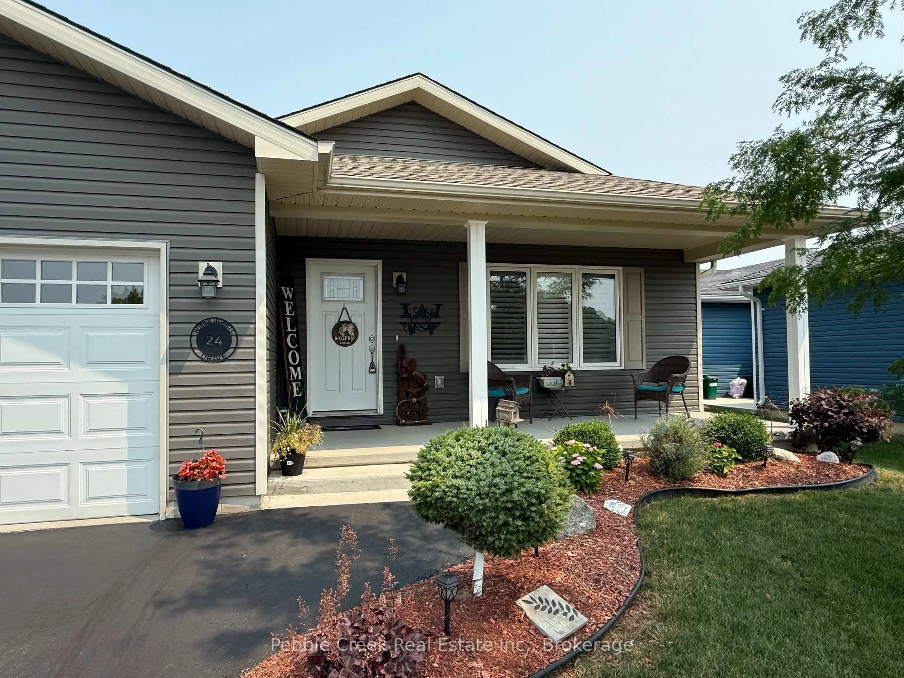 Home with vinyl exterior material, street for 24 Huron Heights Dr, Ashfield-Colborne-Wawanosh Ontario N7A 0B1