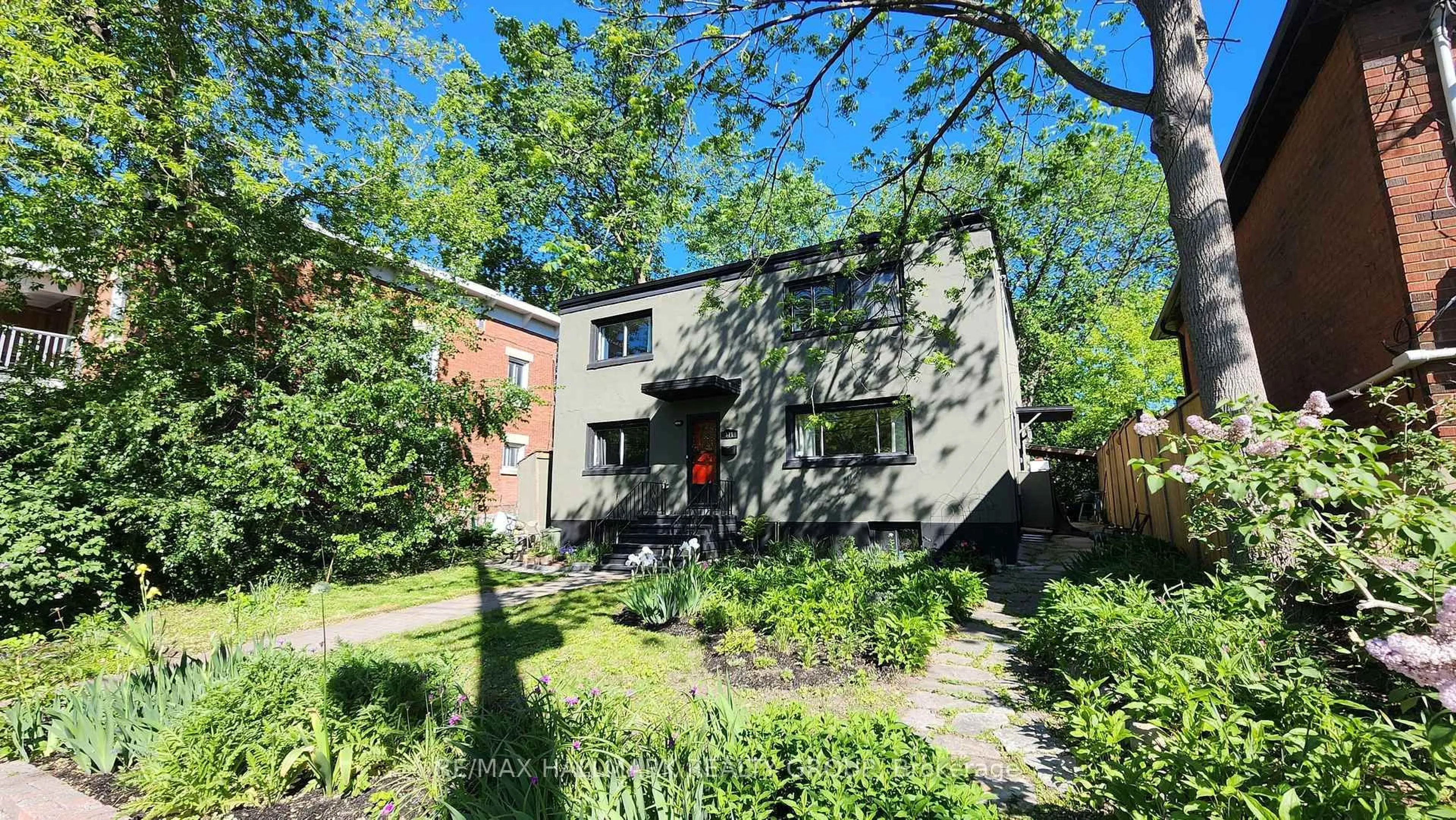 A pic from outside/outdoor area/front of a property/back of a property/a pic from drone, street for 371 Sunnyside Ave, Ottawa Ontario K1S 0S2