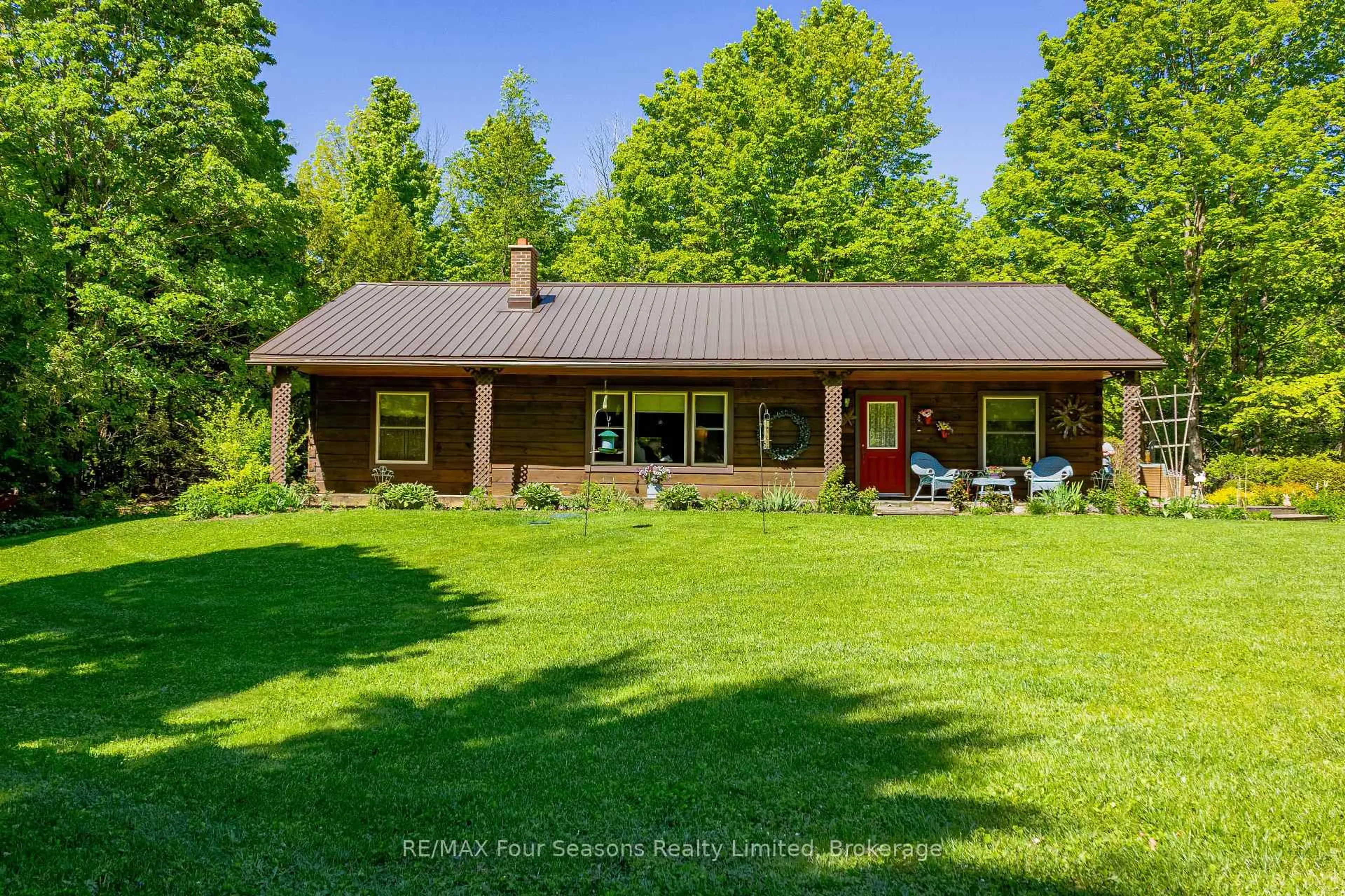 A pic from outside/outdoor area/front of a property/back of a property/a pic from drone, water/lake/river/ocean view for 600072 50 Sdrd, Chatsworth Ontario N0H 1R0