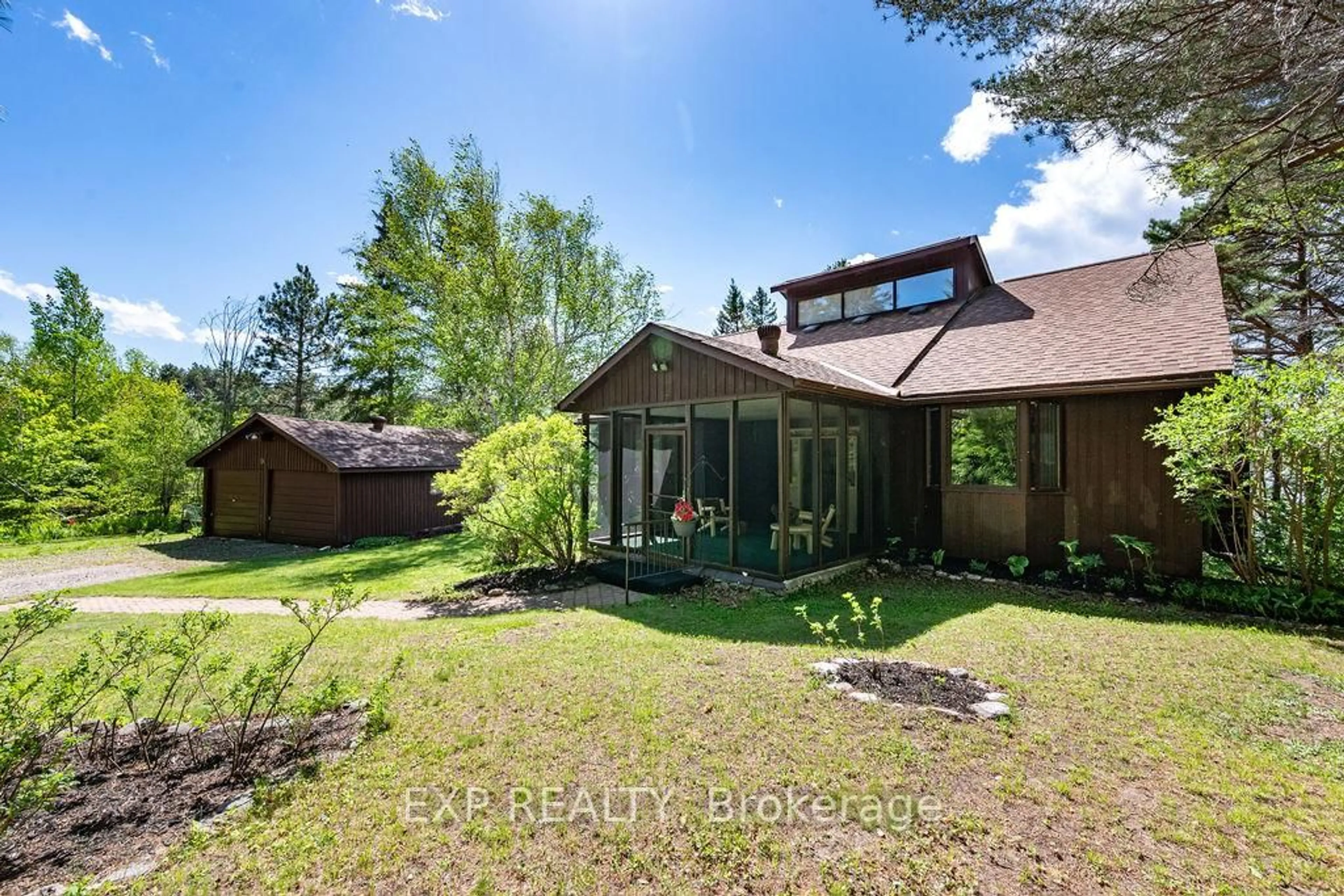 A pic from outside/outdoor area/front of a property/back of a property/a pic from drone, forest/trees view for 56 Lefty Lane, Haley Station Ontario K0J 1Y0