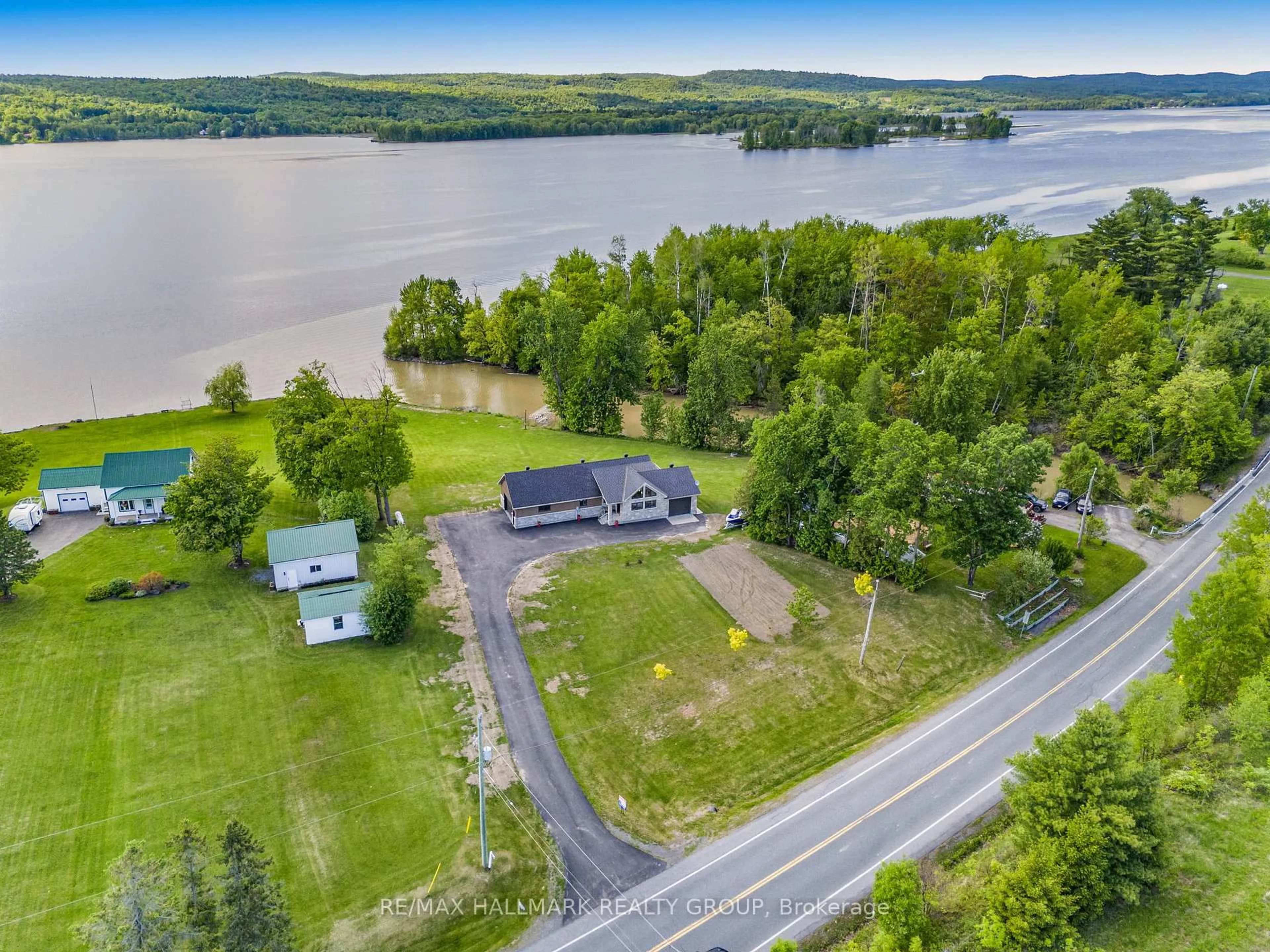 A pic from outside/outdoor area/front of a property/back of a property/a pic from drone, water/lake/river/ocean view for 157 CONCESSION 1 Rd, Alfred and Plantagenet Ontario K0B 1L0