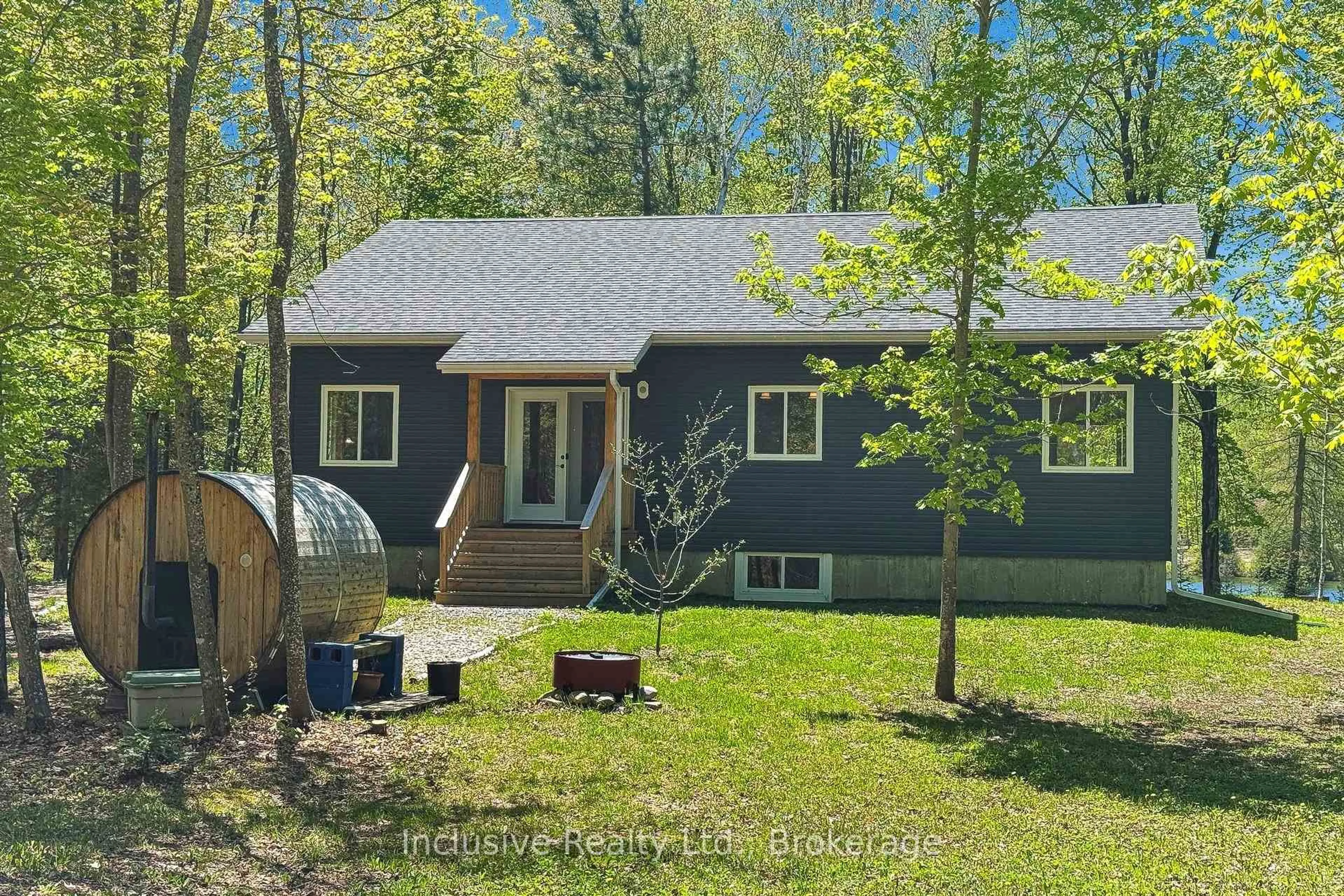 Home with vinyl exterior material, forest/trees view for 1269 Inlet Bay Rd, Highlands East Ontario K0L 1M0