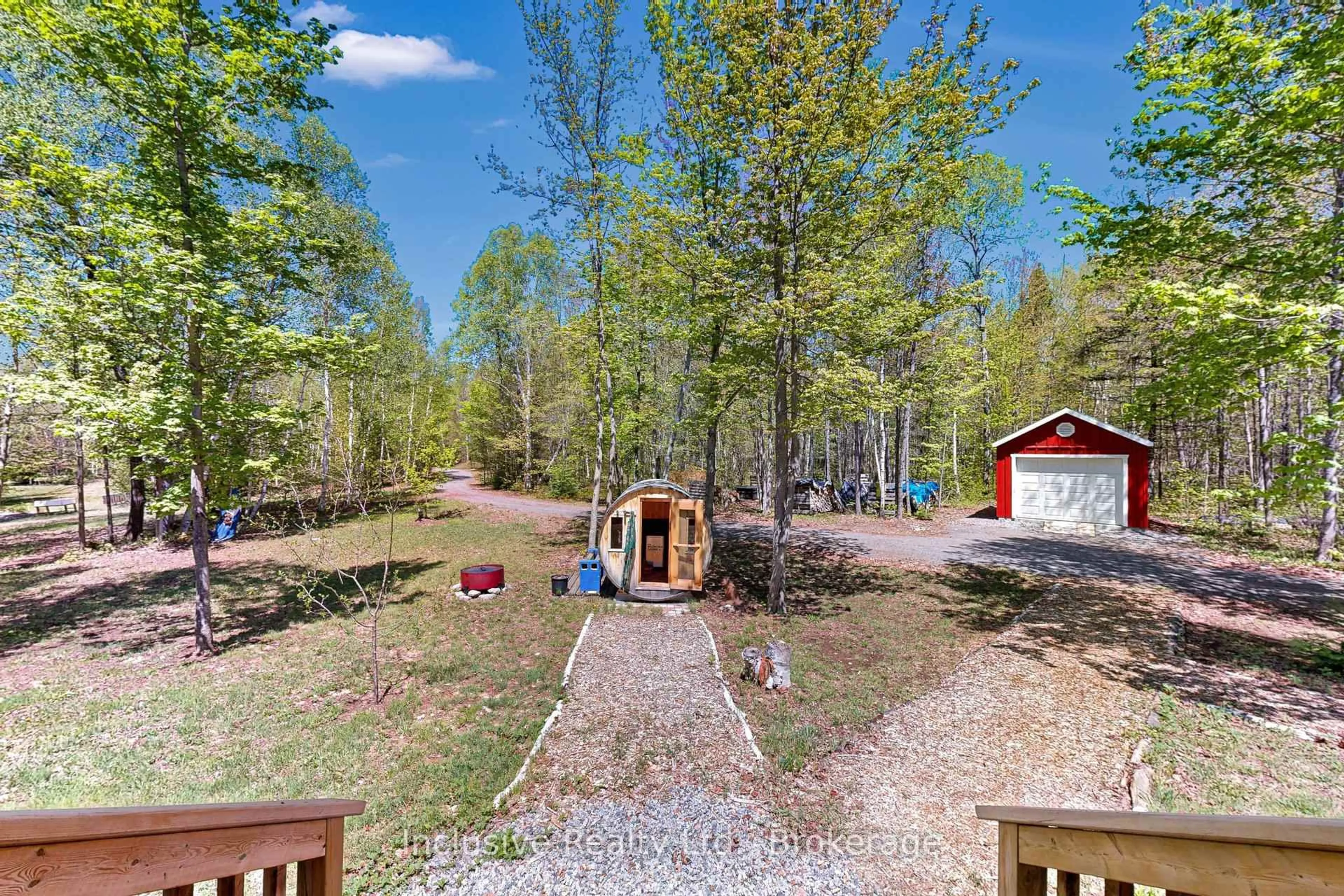 A pic from outside/outdoor area/front of a property/back of a property/a pic from drone, forest/trees view for 1269 Inlet Bay Rd, Highlands East Ontario K0L 1M0