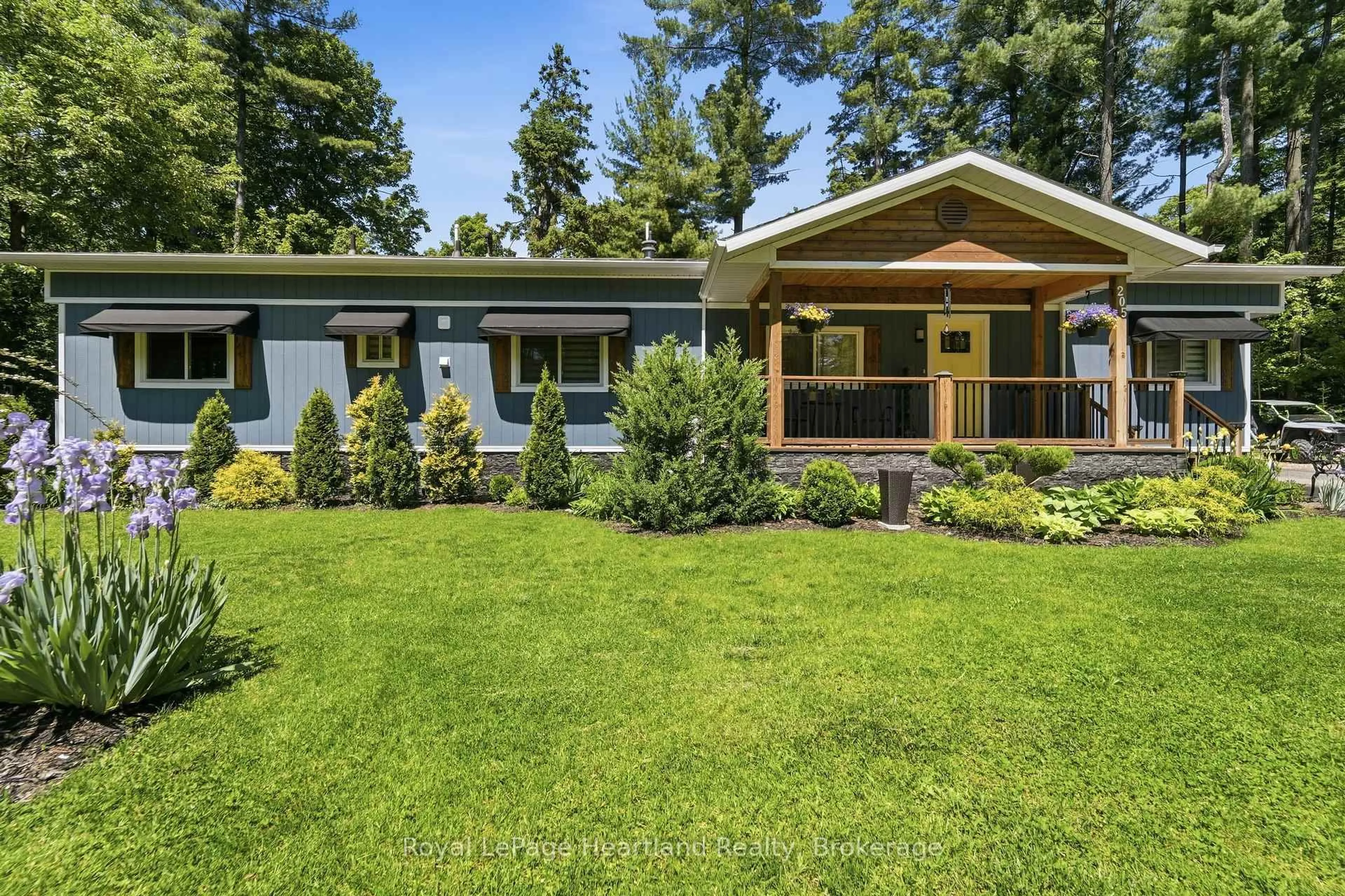 Home with vinyl exterior material, street for 205 Chestnut Dr, Central Huron Ontario N0M 1G0