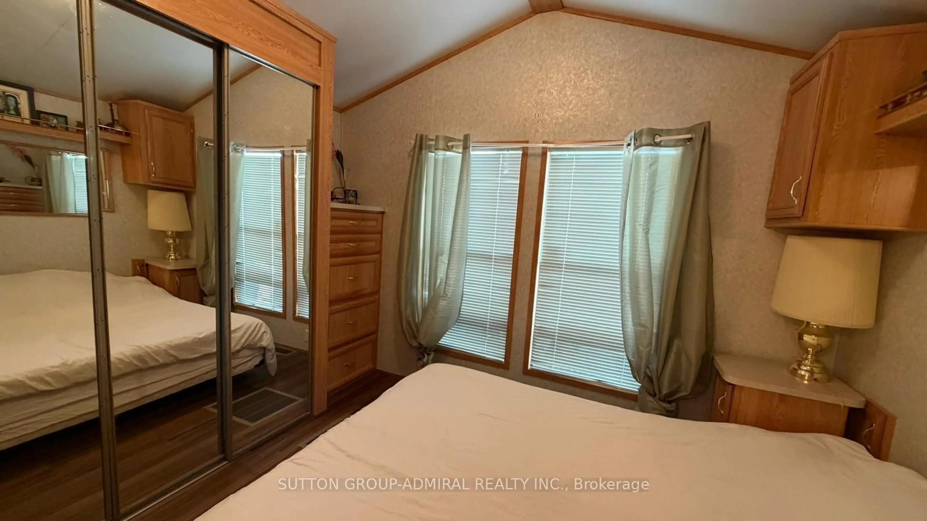Bedroom with bed, wood/laminate floor for 497 COUNTY RD 36 Rd #46, Trent Lakes Ontario K0M 1A0