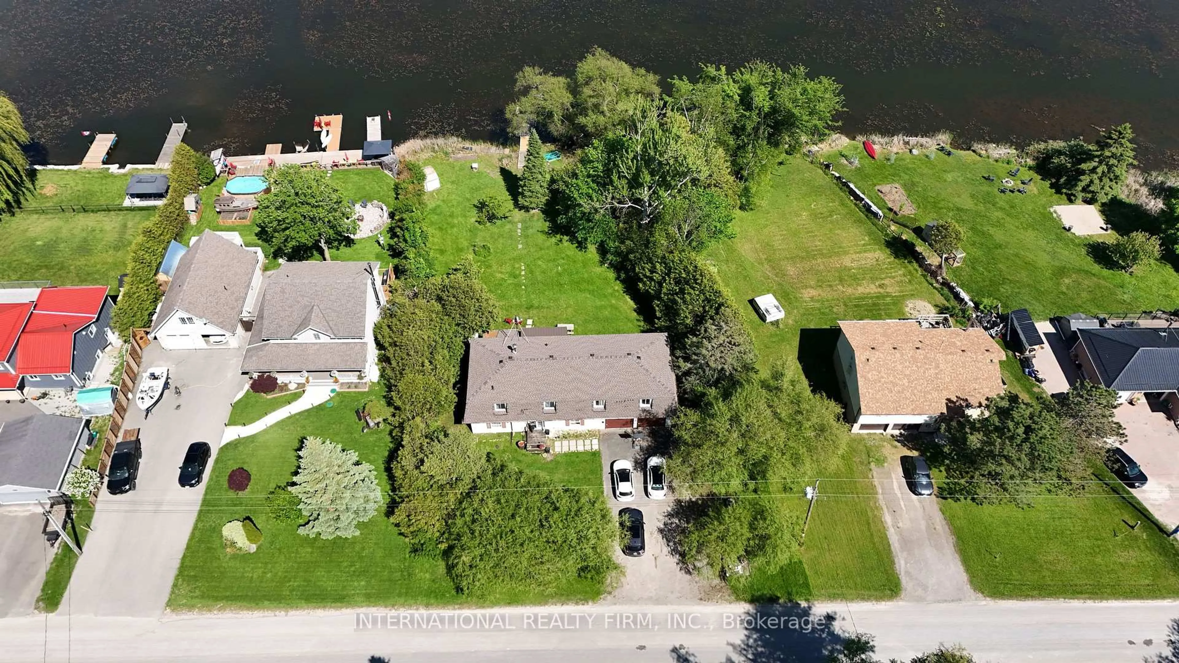 A pic from outside/outdoor area/front of a property/back of a property/a pic from drone, water/lake/river/ocean view for 100 O'reilly Lane, Kawartha Lakes Ontario K0M 2C0