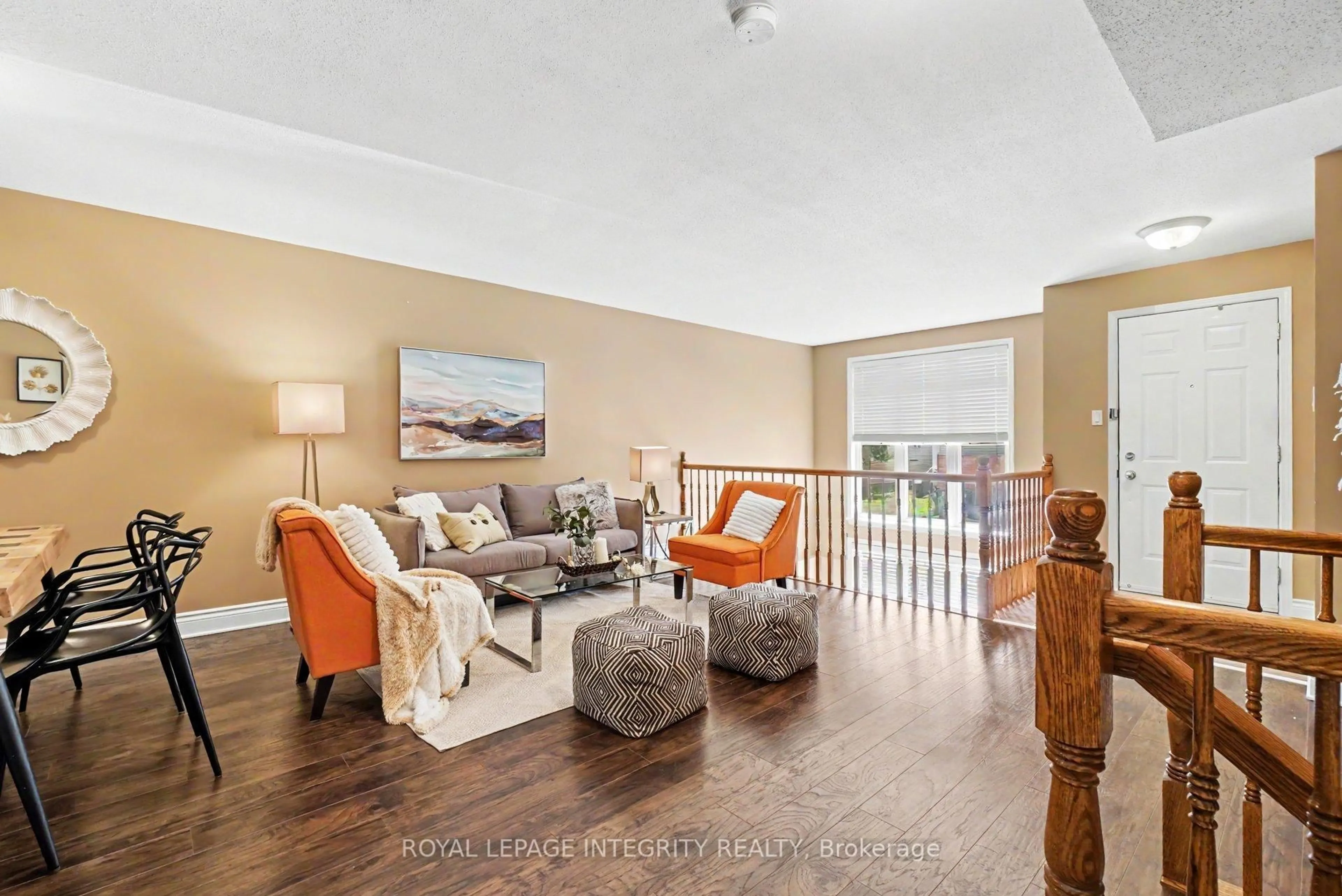 Living room with furniture, wood/laminate floor for 1512 Walkley Rd #128, Ottawa Ontario K1V 2G5