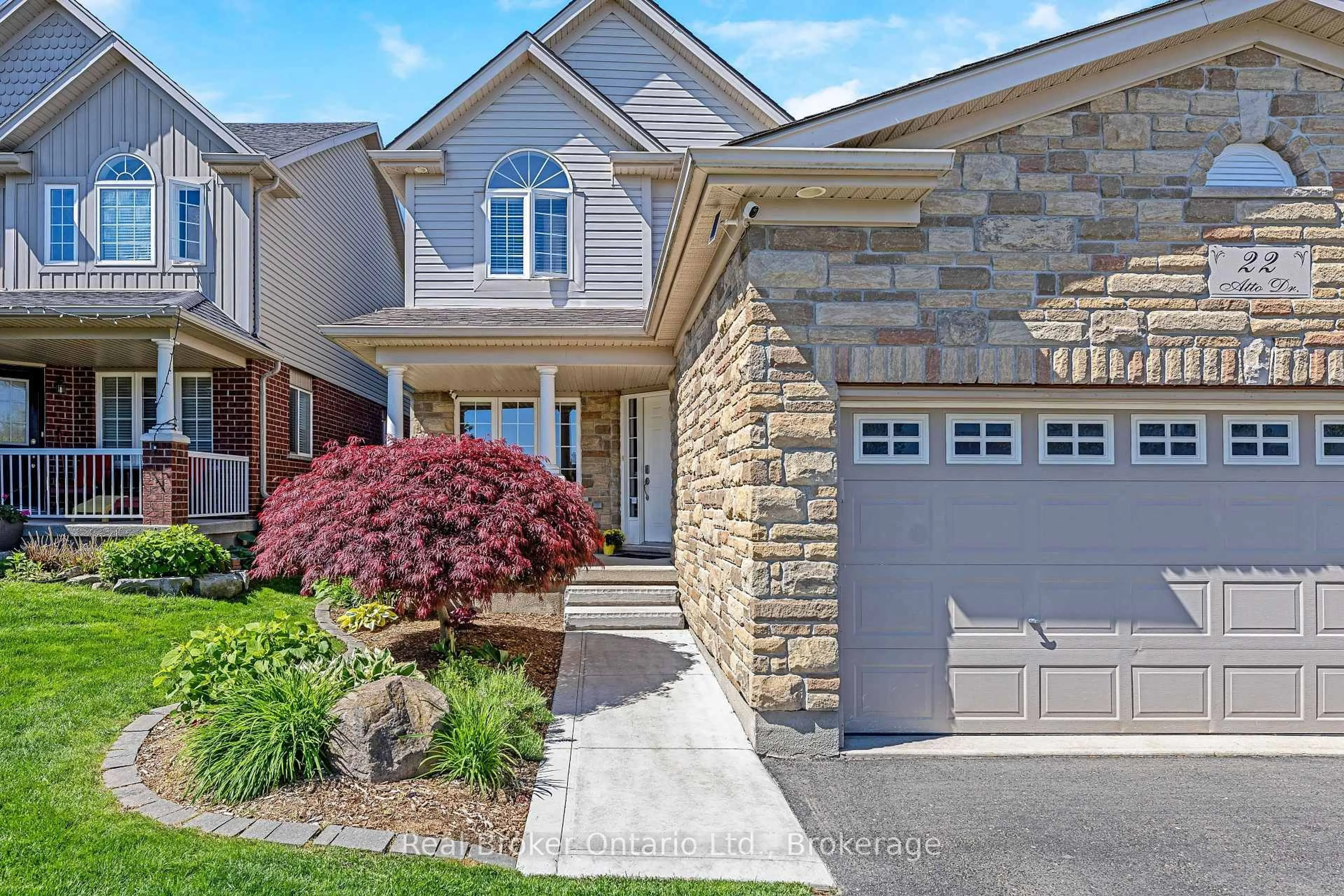 Home with brick exterior material, street for 22 ATTO Dr, Guelph Ontario N1E 0E4
