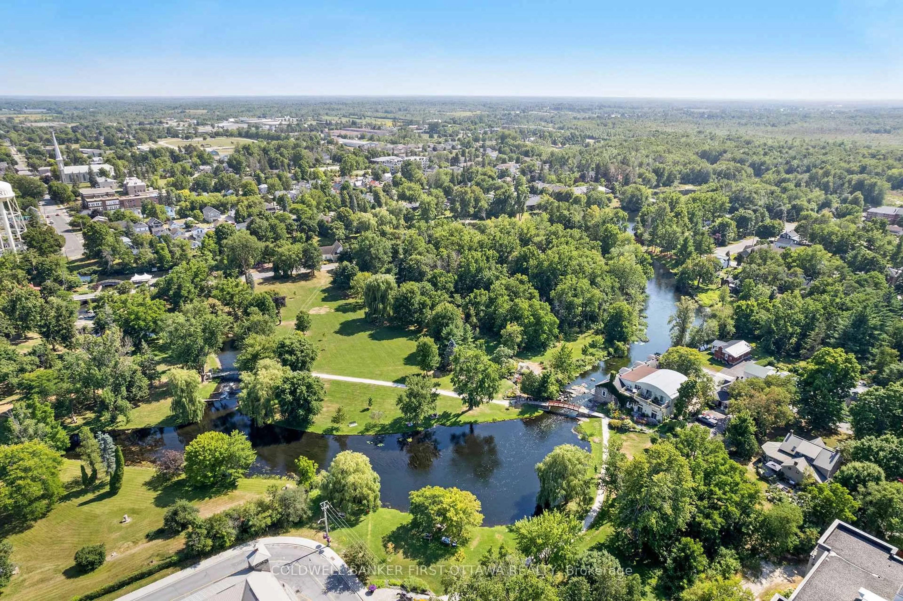 A pic from outside/outdoor area/front of a property/back of a property/a pic from drone, water/lake/river/ocean view for 7A Lewis St, Perth Ontario K7H 1M6