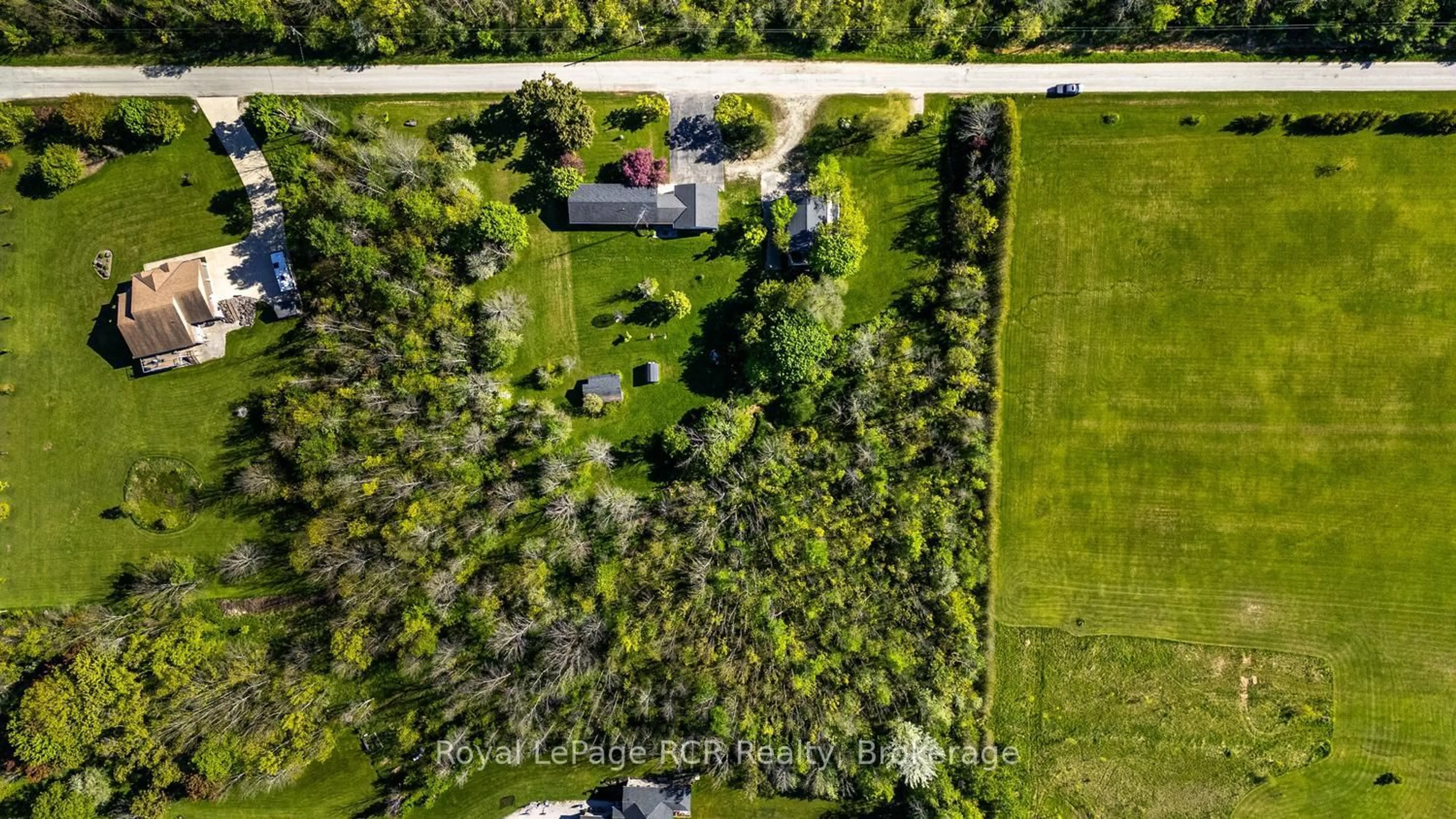 A pic from outside/outdoor area/front of a property/back of a property/a pic from drone, street for 873 14th St, Georgian Bluffs Ontario N4K 6V5