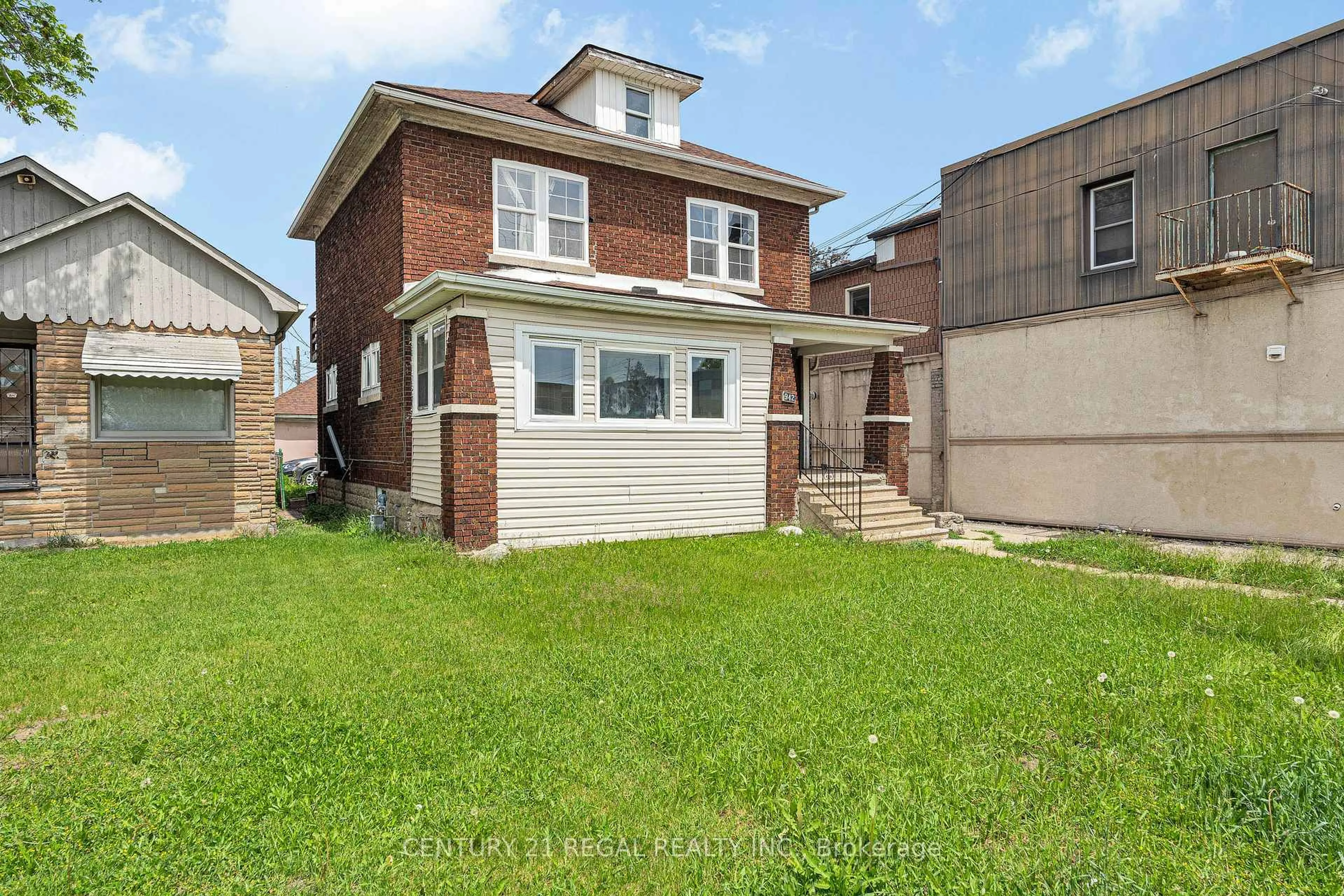 Home with brick exterior material, street for 942 Tecumseh Rd, Windsor Ontario N8X 2S6