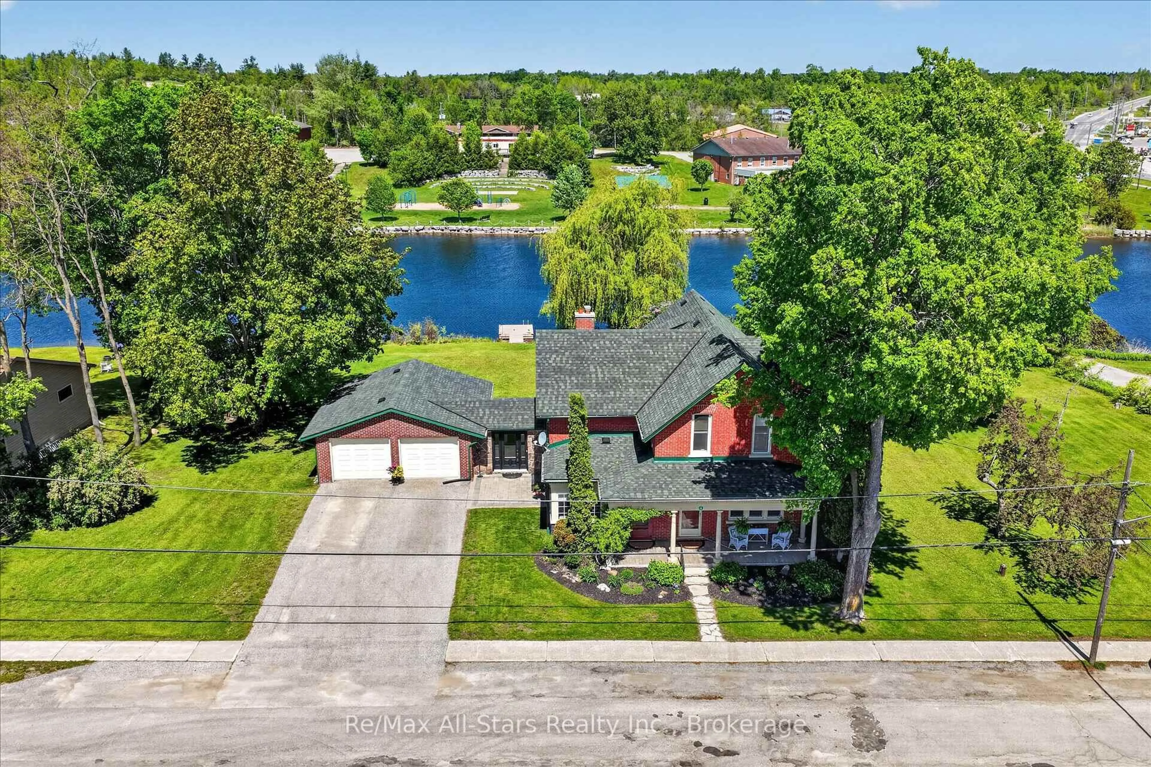 A pic from outside/outdoor area/front of a property/back of a property/a pic from drone, water/lake/river/ocean view for 14 Albert St, Kawartha Lakes Ontario K0M 1K0