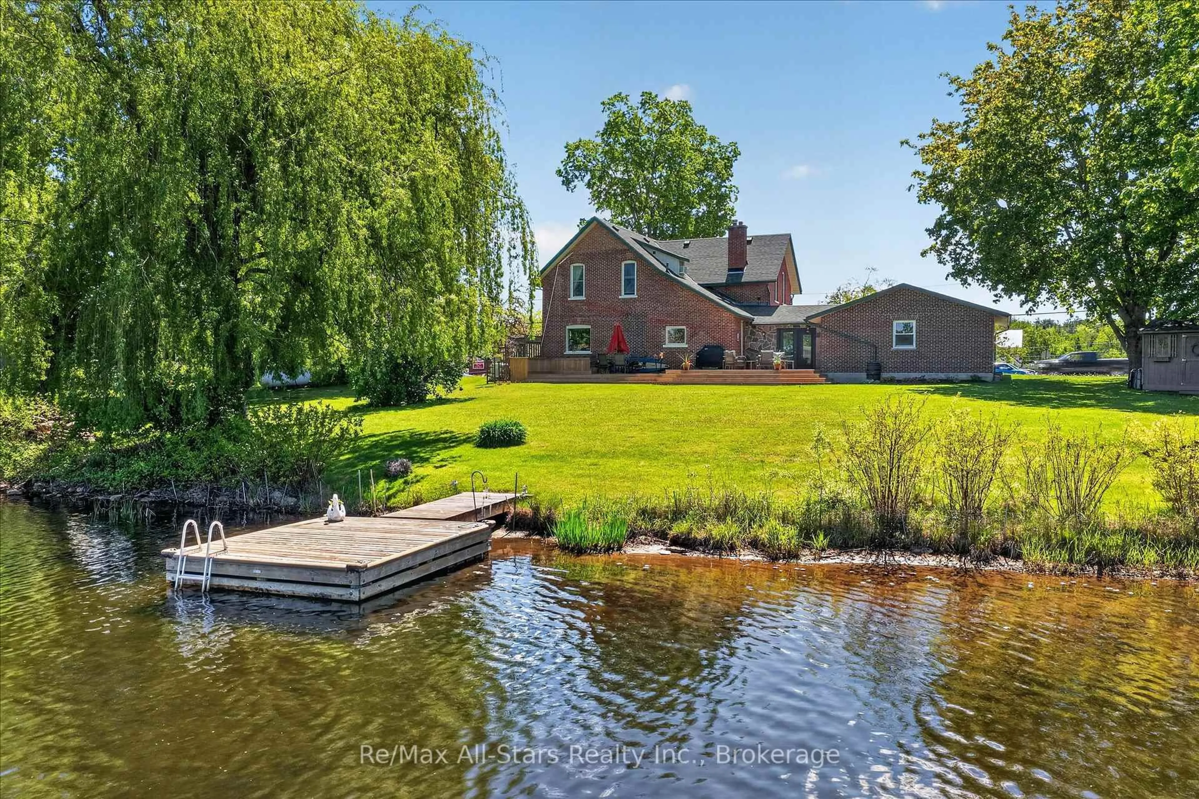 A pic from outside/outdoor area/front of a property/back of a property/a pic from drone, water/lake/river/ocean view for 14 Albert St, Kawartha Lakes Ontario K0M 1K0