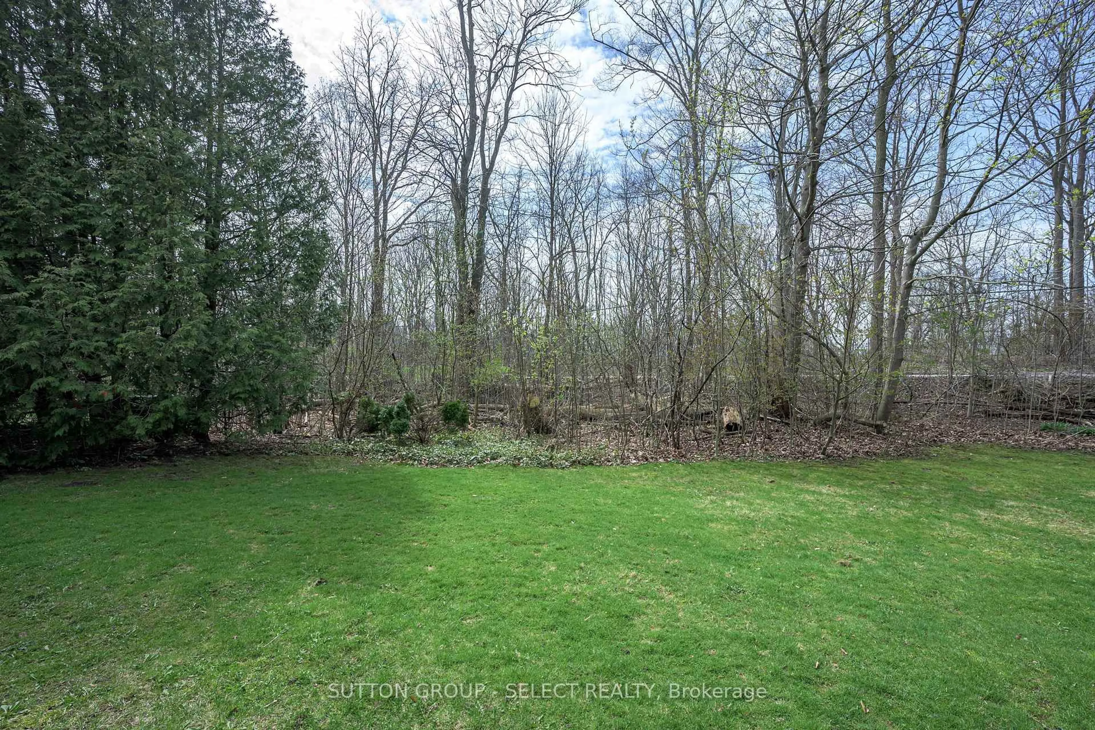 A pic from outside/outdoor area/front of a property/back of a property/a pic from drone, forest/trees view for 70 Glenroy Rd #19, London South Ontario N5Z 4W9