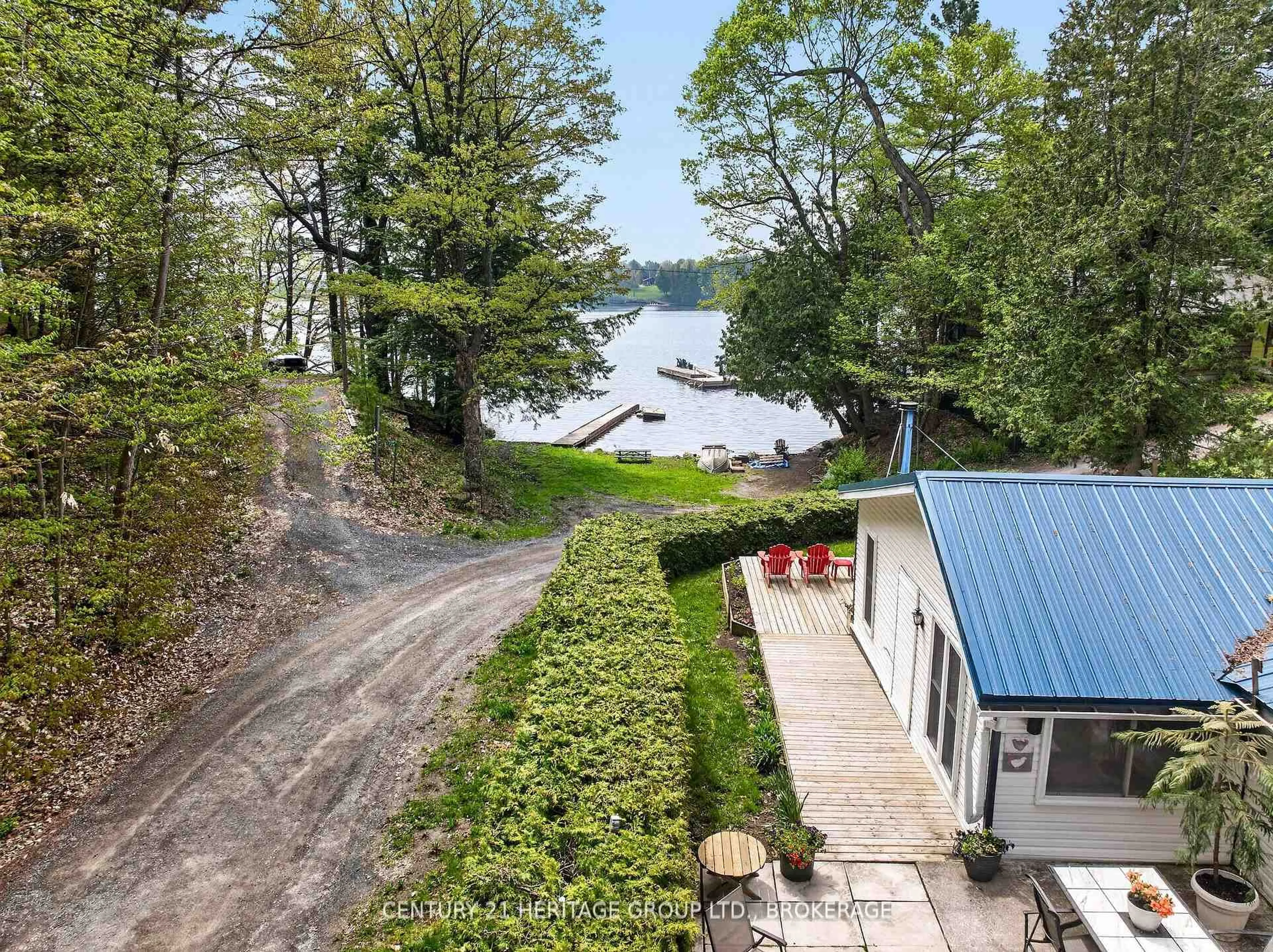A pic from outside/outdoor area/front of a property/back of a property/a pic from drone, water/lake/river/ocean view for 1726 Turcotte Lane, Gananoque Ontario K7G 2V5