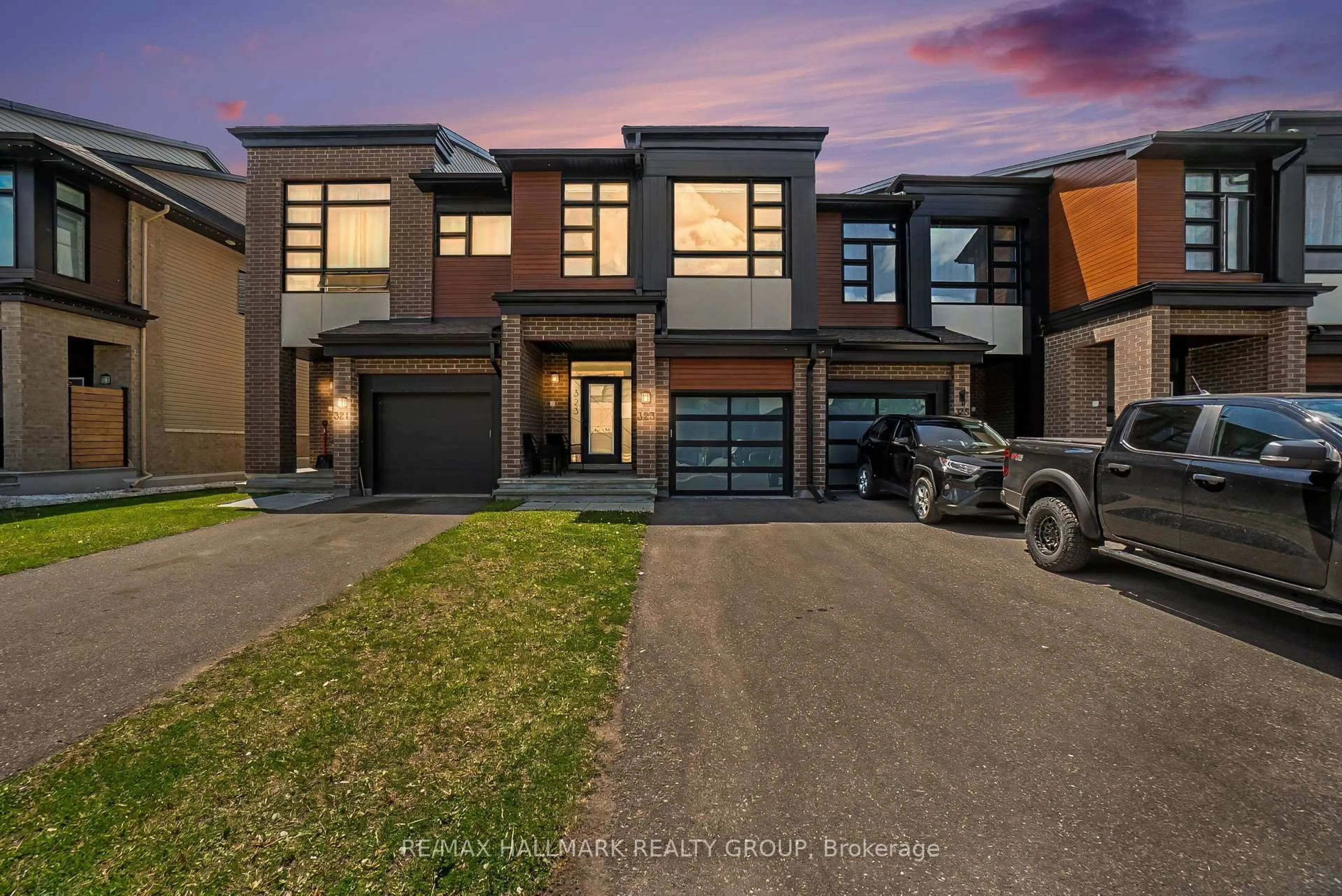 Home with brick exterior material, street for 323 Wabasso Lane, Ottawa Ontario K1T 0T2