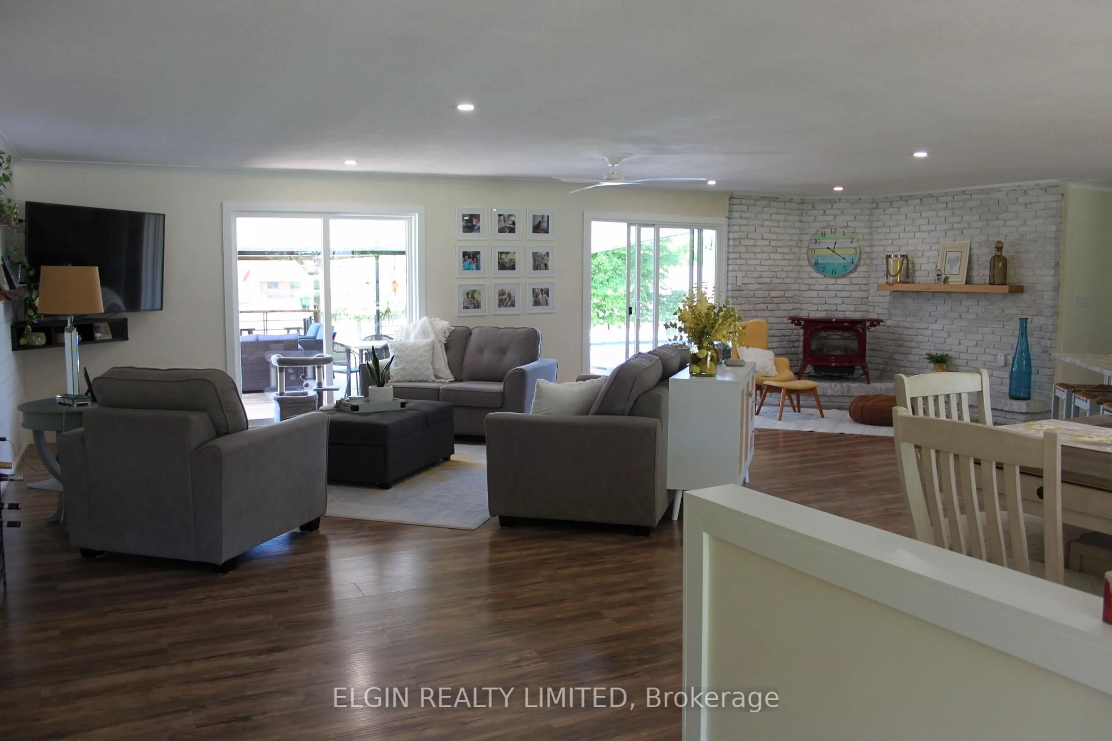 Living room with furniture, wood/laminate floor for 42445 John Wise Line, Central Elgin Ontario N5R 5T4