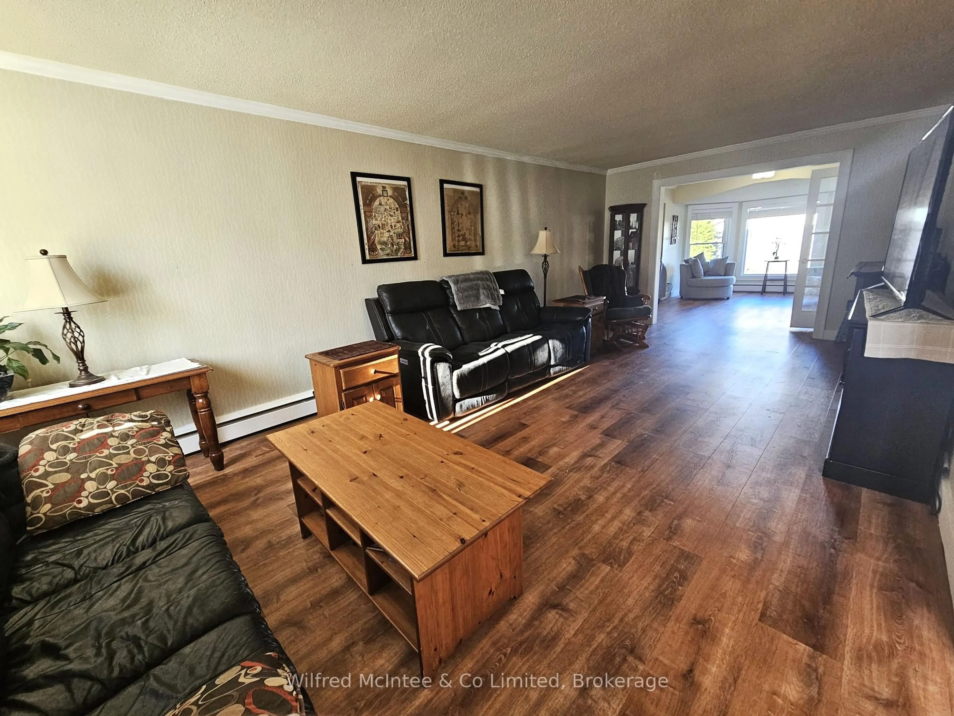 Living room with furniture, wood/laminate floor for 958 6TH Ave, Owen Sound Ontario N5K 5G4