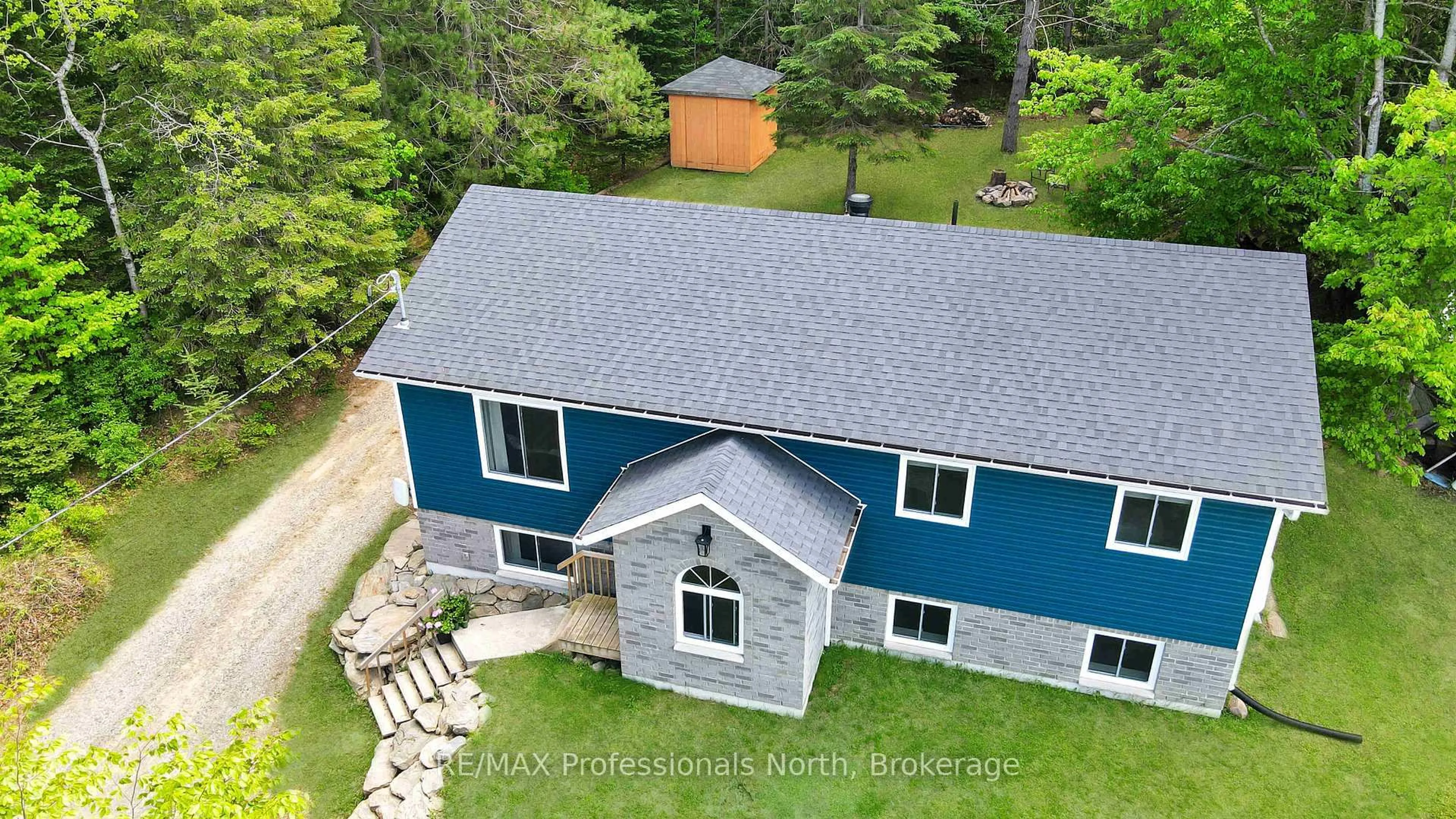 A pic from outside/outdoor area/front of a property/back of a property/a pic from drone, unknown for 4342 County Road 21, Dysart et al Ontario K0M 1S0