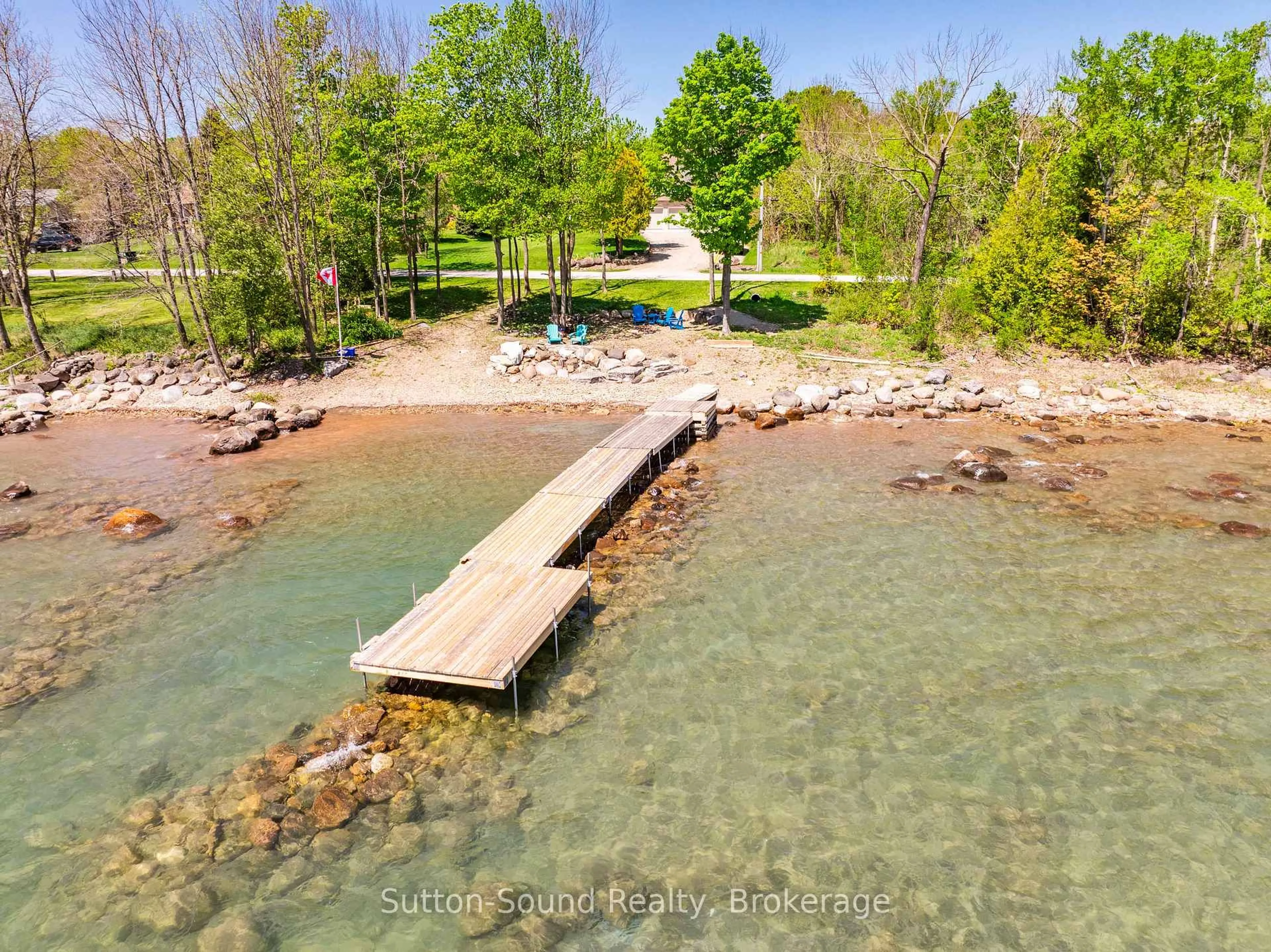 A pic from outside/outdoor area/front of a property/back of a property/a pic from drone, water/lake/river/ocean view for 339566 PRESQU'ILE Rd, Georgian Bluffs Ontario N0H 1S0