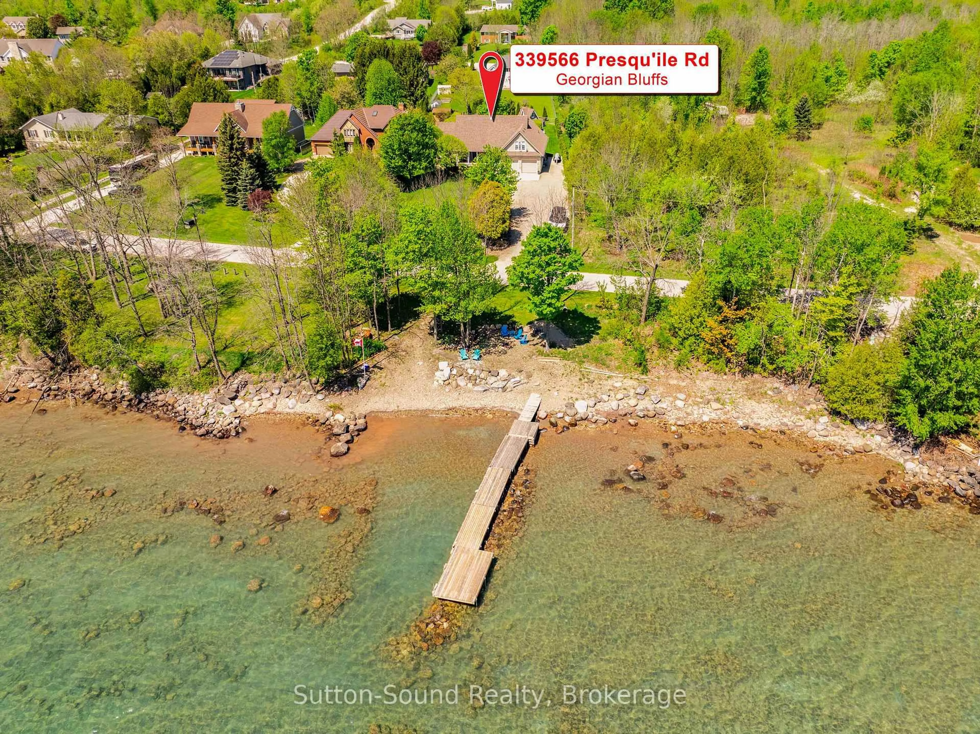 A pic from outside/outdoor area/front of a property/back of a property/a pic from drone, water/lake/river/ocean view for 339566 PRESQU'ILE Rd, Georgian Bluffs Ontario N0H 1S0