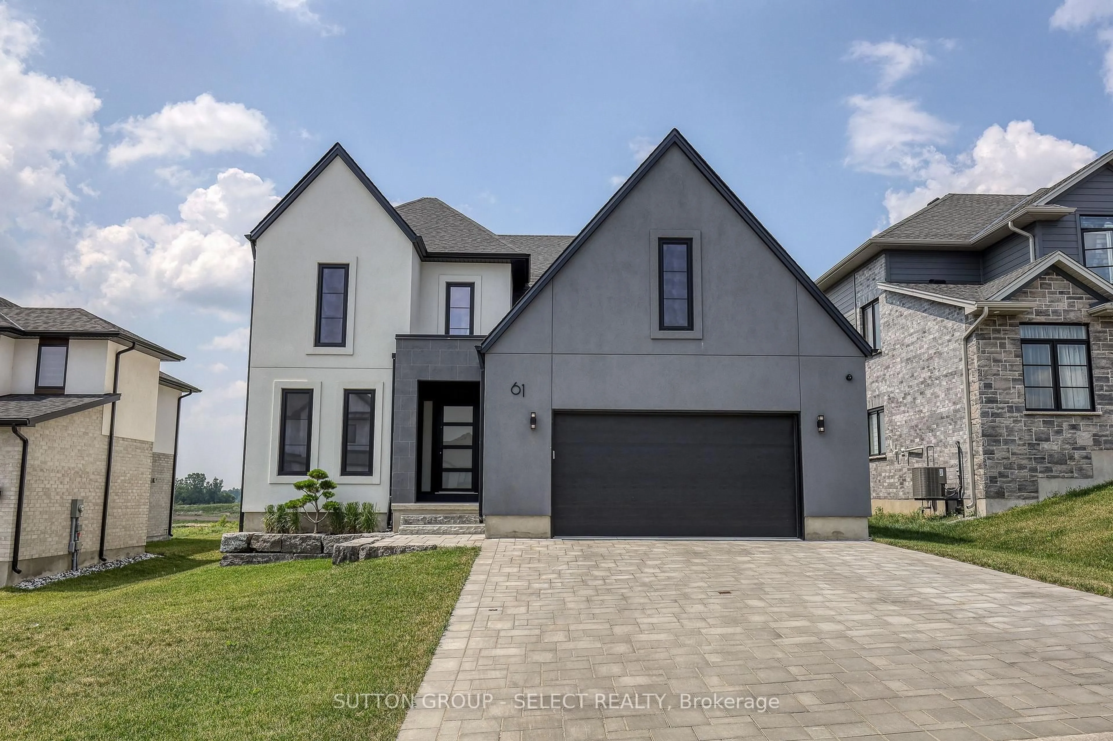 Home with brick exterior material, street for 61 CRESTVIEW Dr, Middlesex Centre Ontario N0L 1R0