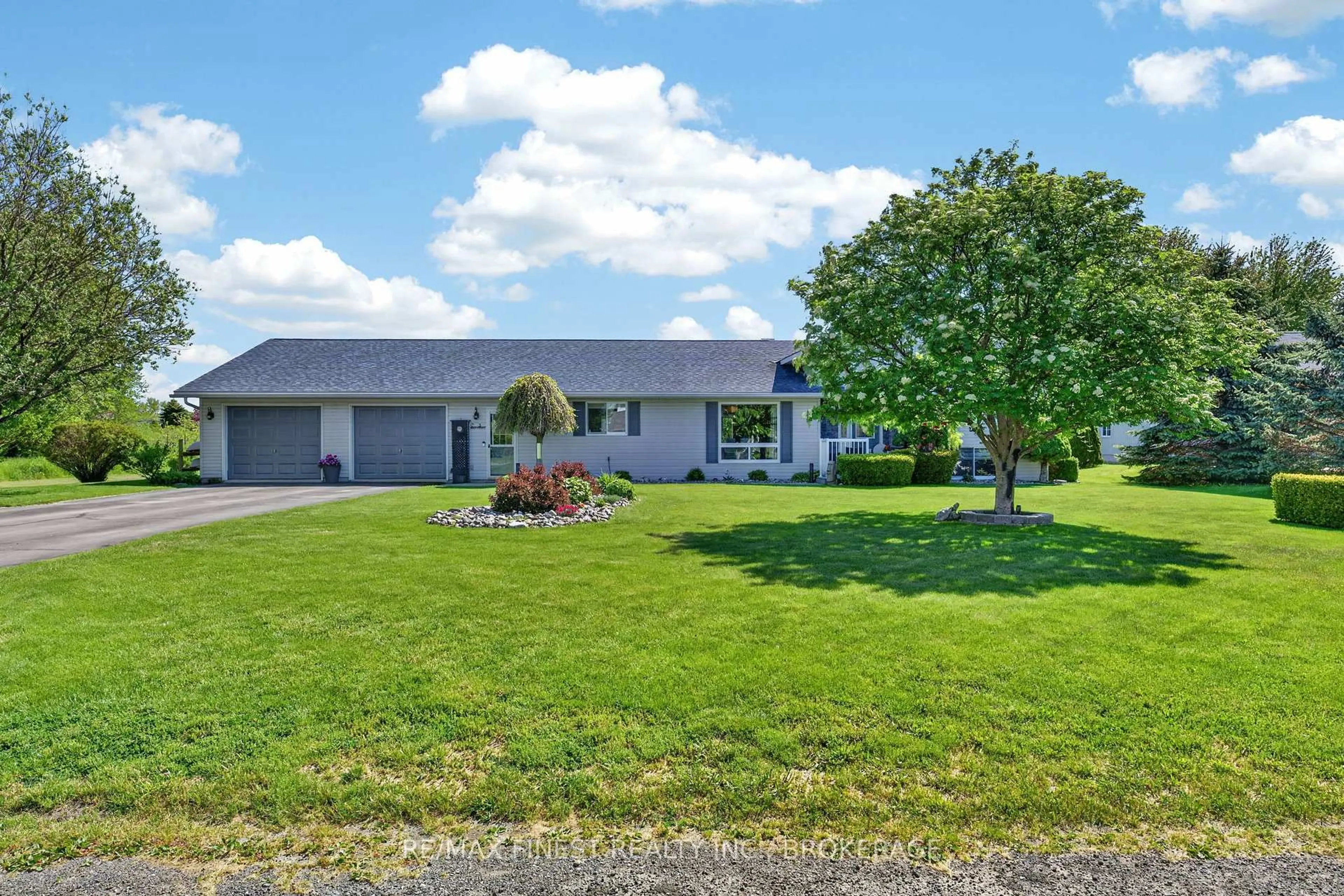 A pic from outside/outdoor area/front of a property/back of a property/a pic from drone, water/lake/river/ocean view for 3 Mary Ave, Prince Edward County Ontario K0K 3L0