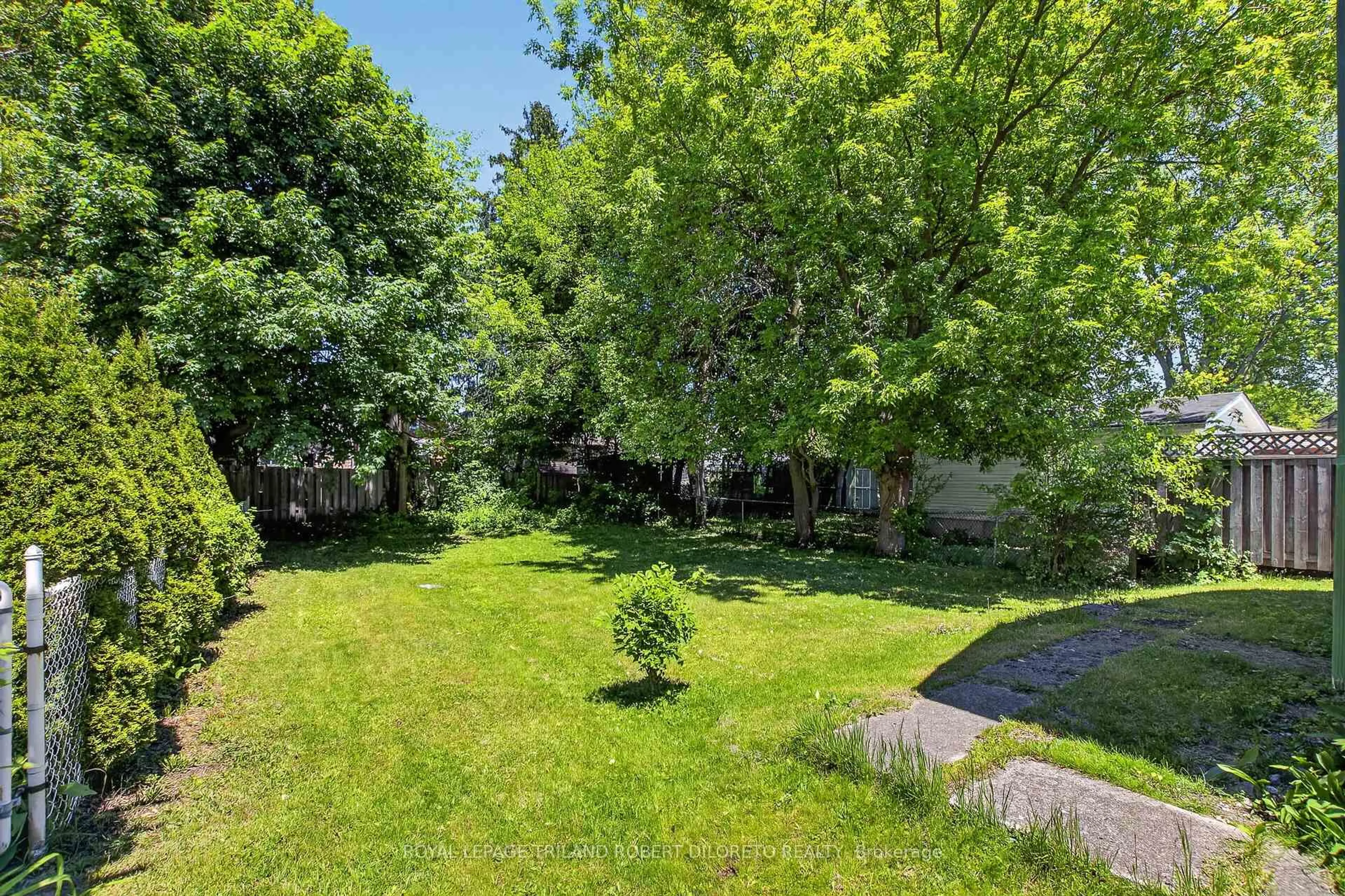 A pic from outside/outdoor area/front of a property/back of a property/a pic from drone, forest/trees view for 80 Beattie Ave, London East Ontario N5W 2P2