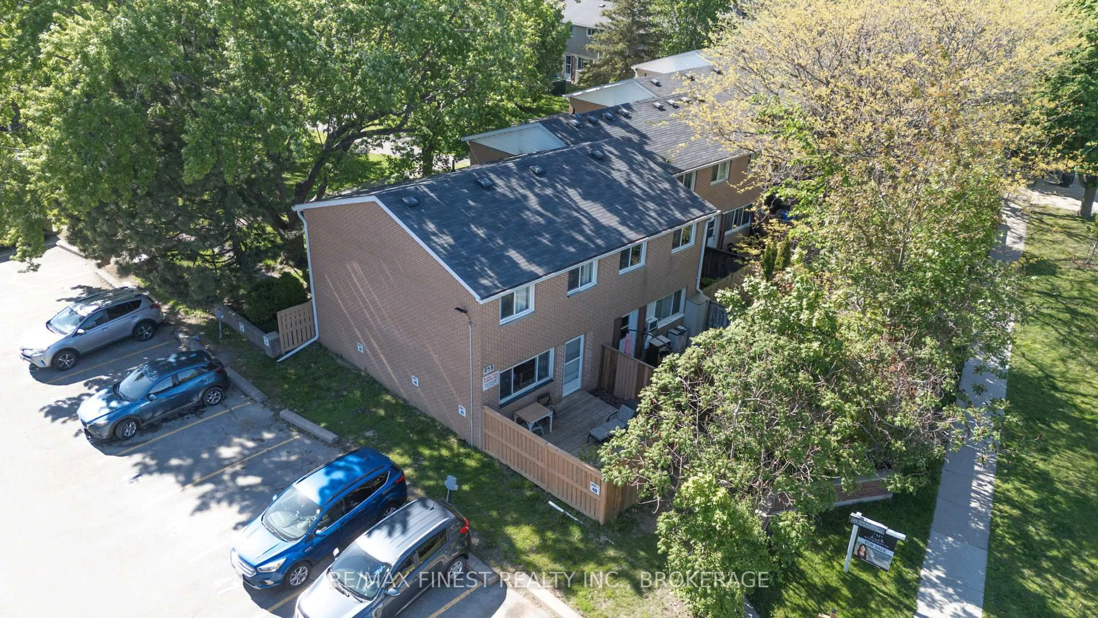 A pic from outside/outdoor area/front of a property/back of a property/a pic from drone, street for 258 Queen Mary Rd #50, Kingston Ontario K7M 2B2