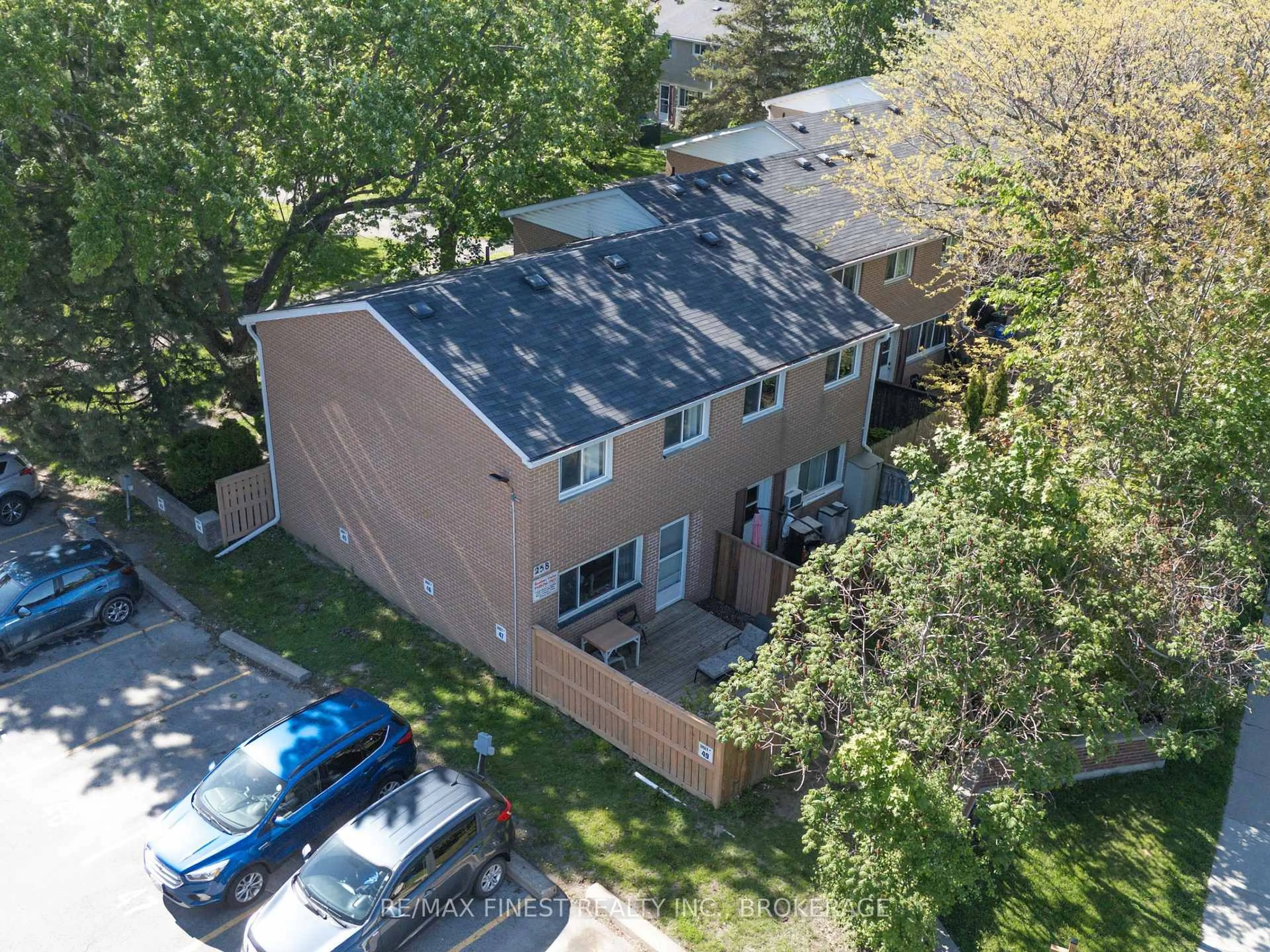 A pic from outside/outdoor area/front of a property/back of a property/a pic from drone, street for 258 Queen Mary Rd #50, Kingston Ontario K7M 2B2
