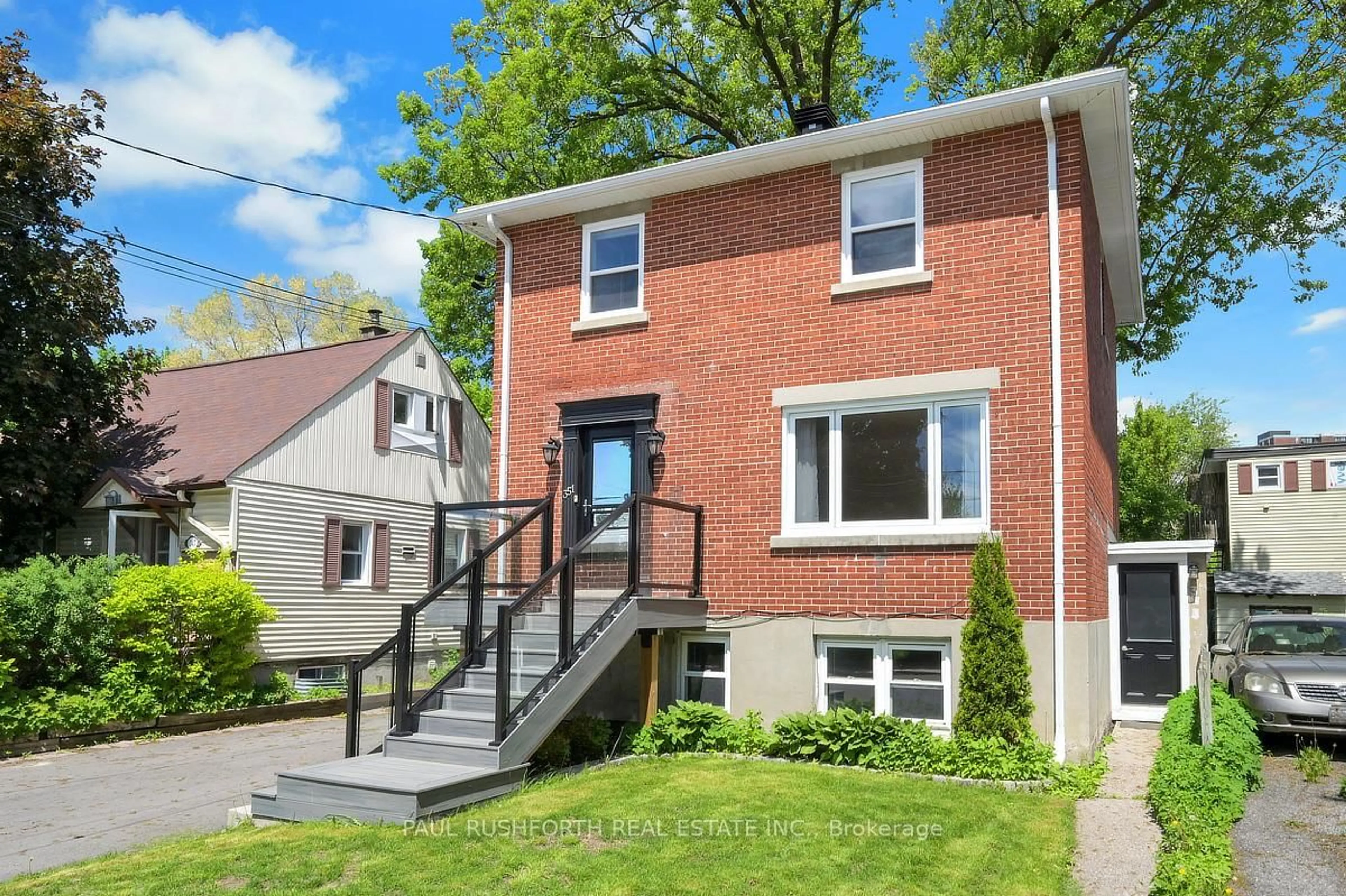 Home with brick exterior material, street for 351 - 353 Richelieu Ave, Ottawa Ontario K1L 6J6
