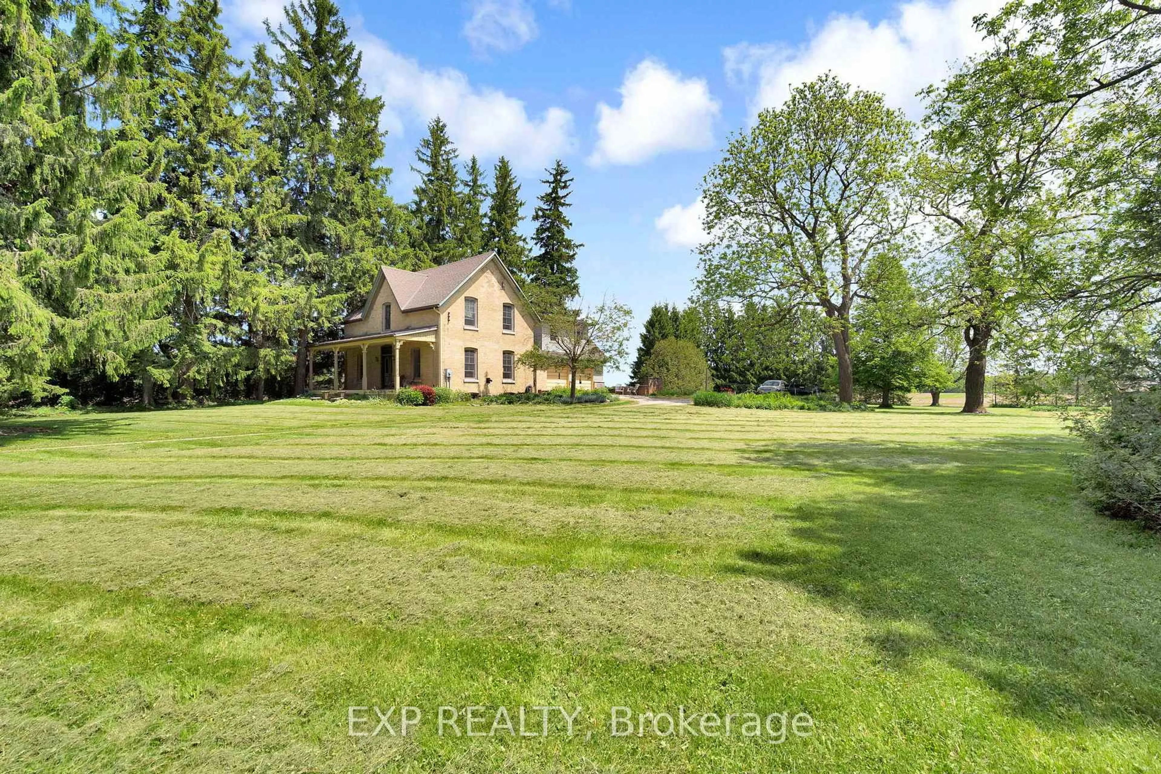 A pic from outside/outdoor area/front of a property/back of a property/a pic from drone, water/lake/river/ocean view for 21406 Purple Hill Rd, Thames Centre Ontario N0M 2P0