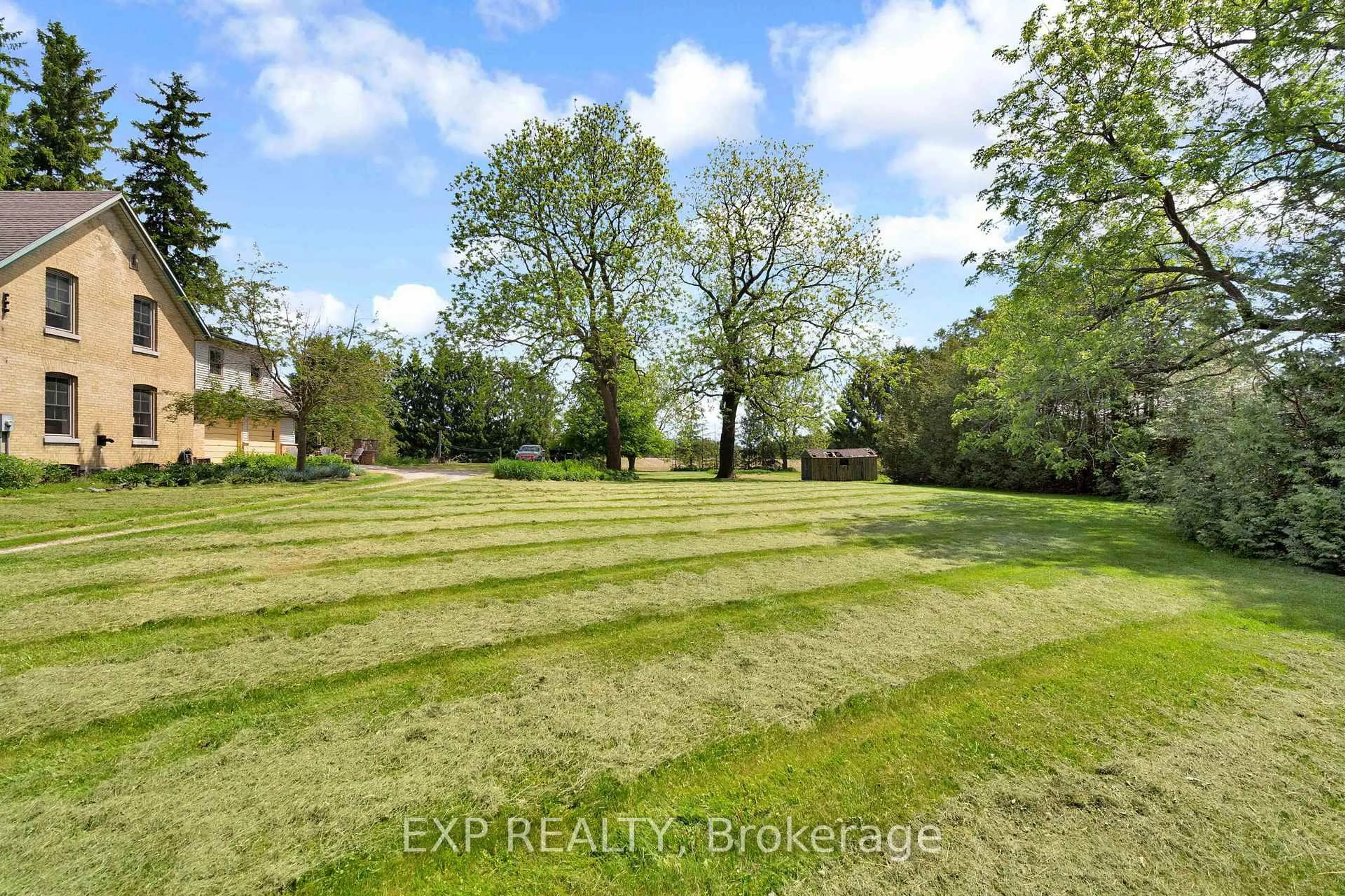 A pic from outside/outdoor area/front of a property/back of a property/a pic from drone, unknown for 21406 Purple Hill Rd, Thames Centre Ontario N0M 2P0
