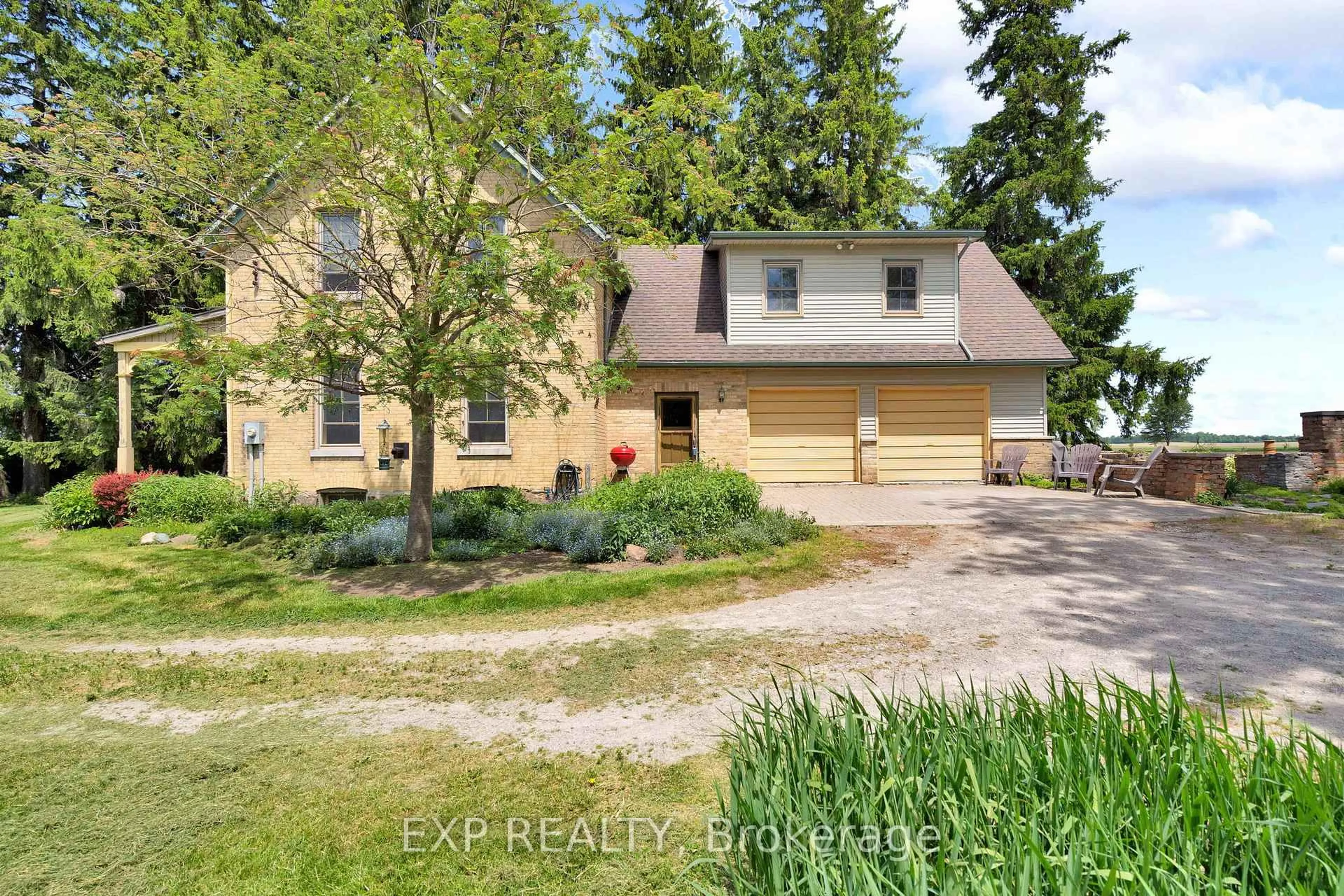A pic from outside/outdoor area/front of a property/back of a property/a pic from drone, street for 21406 Purple Hill Rd, Thames Centre Ontario N0M 2P0